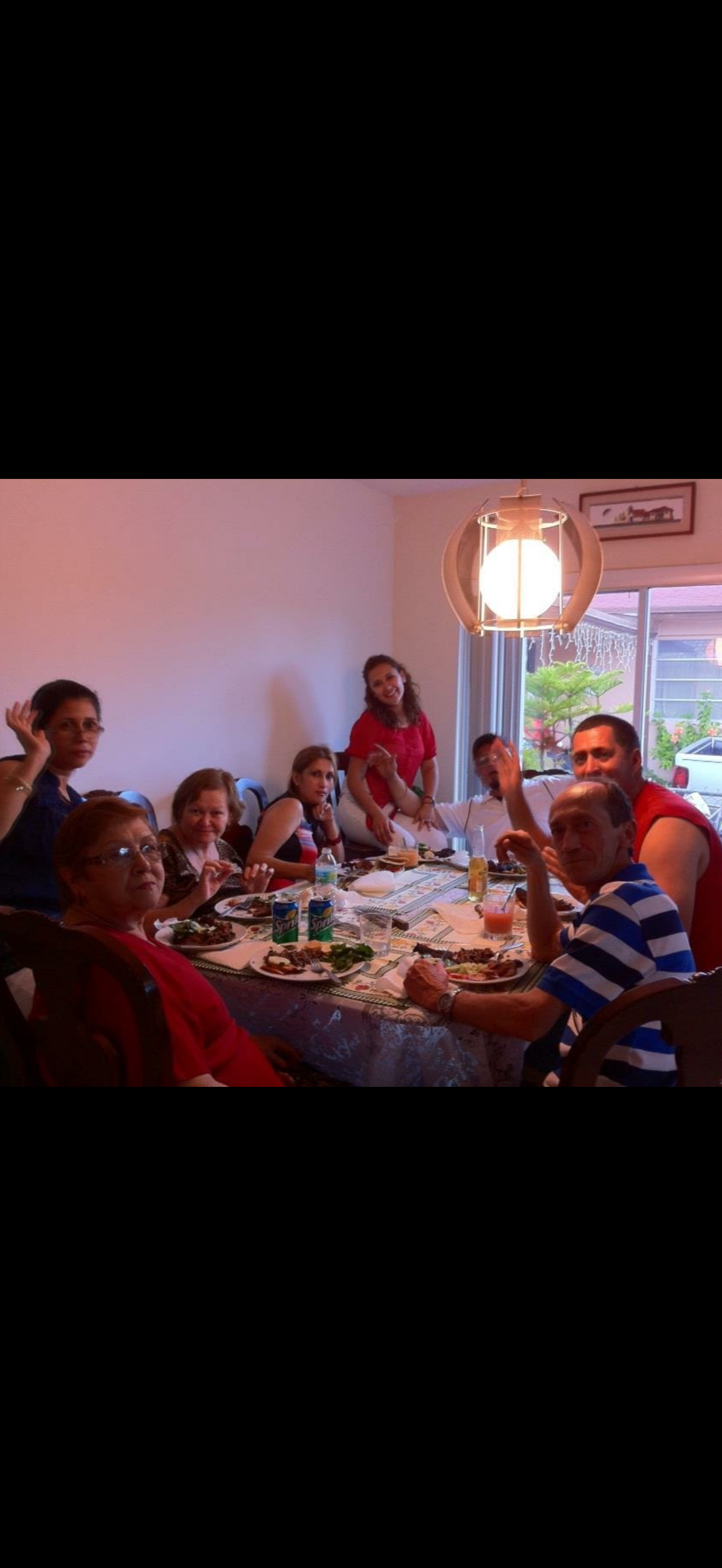 A group of people sitting around a table