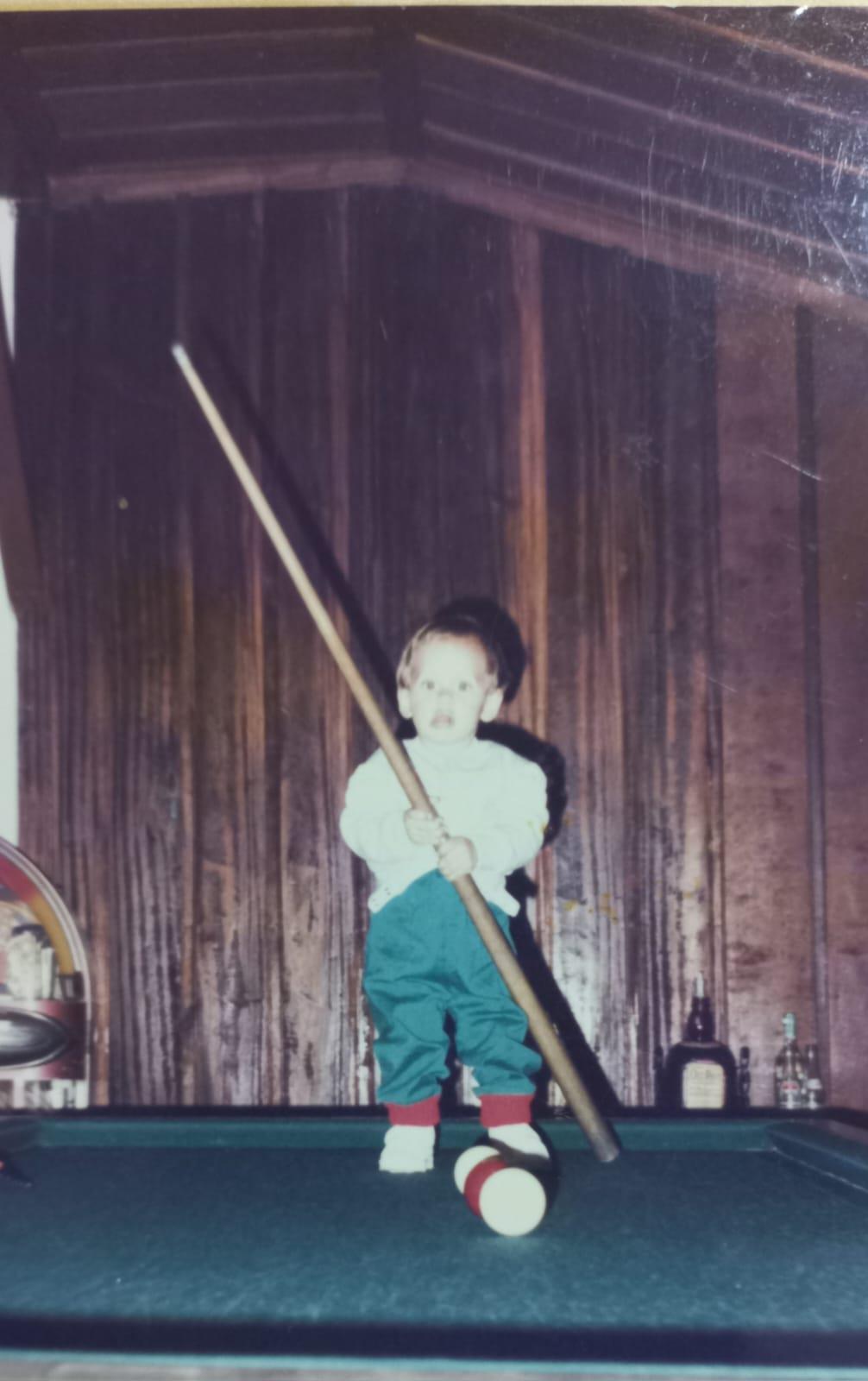 A child holding a stick
