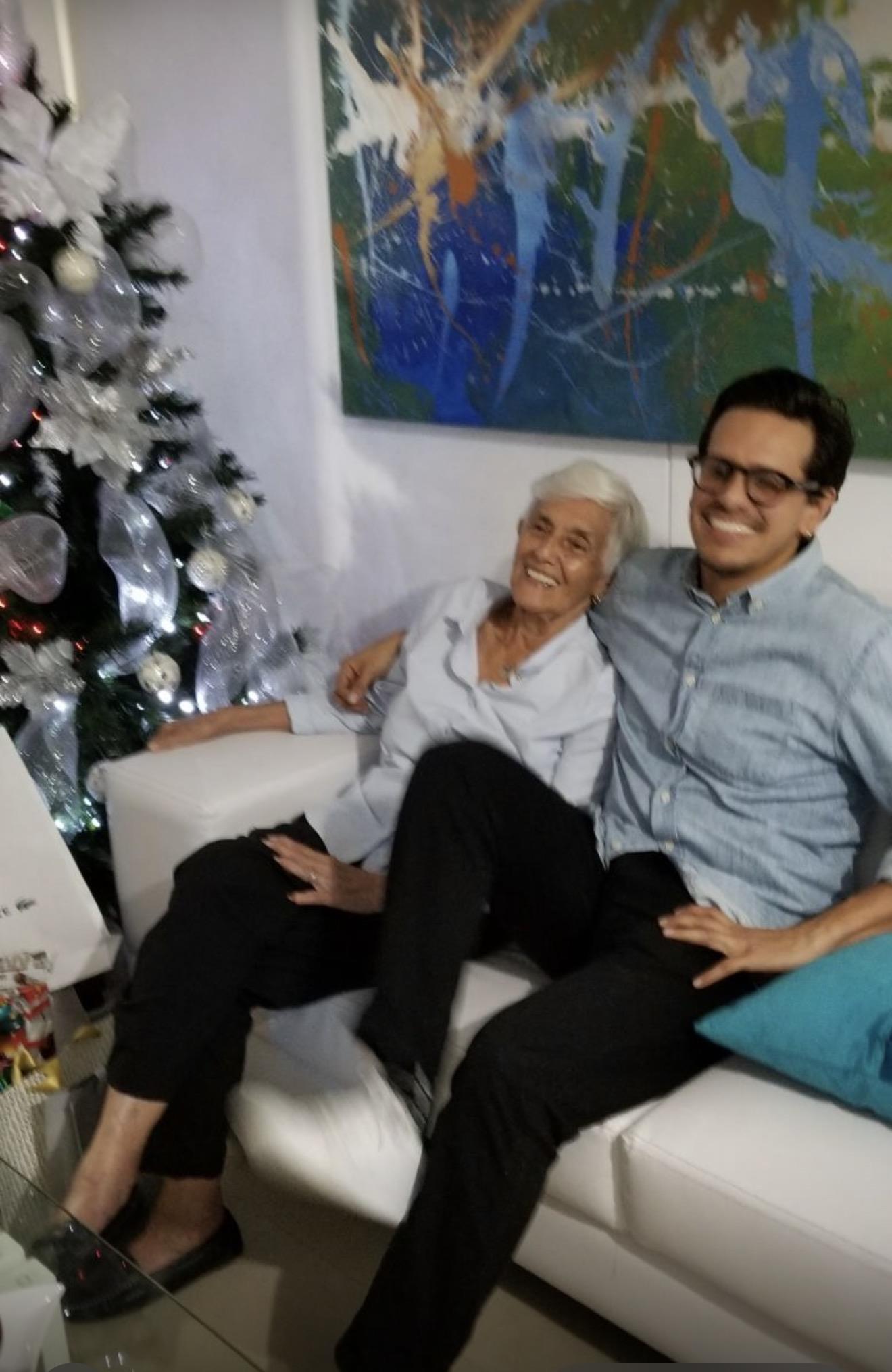 A man and woman sitting on a couch