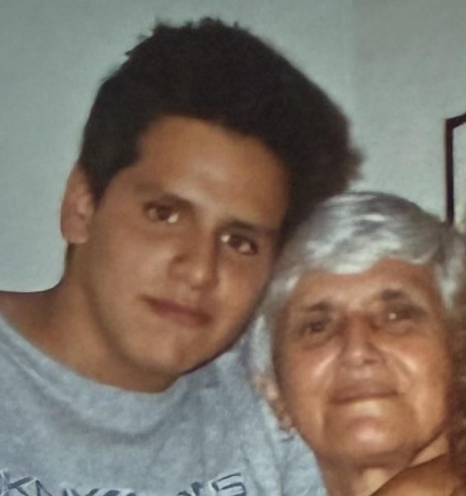 A man and woman posing for a picture