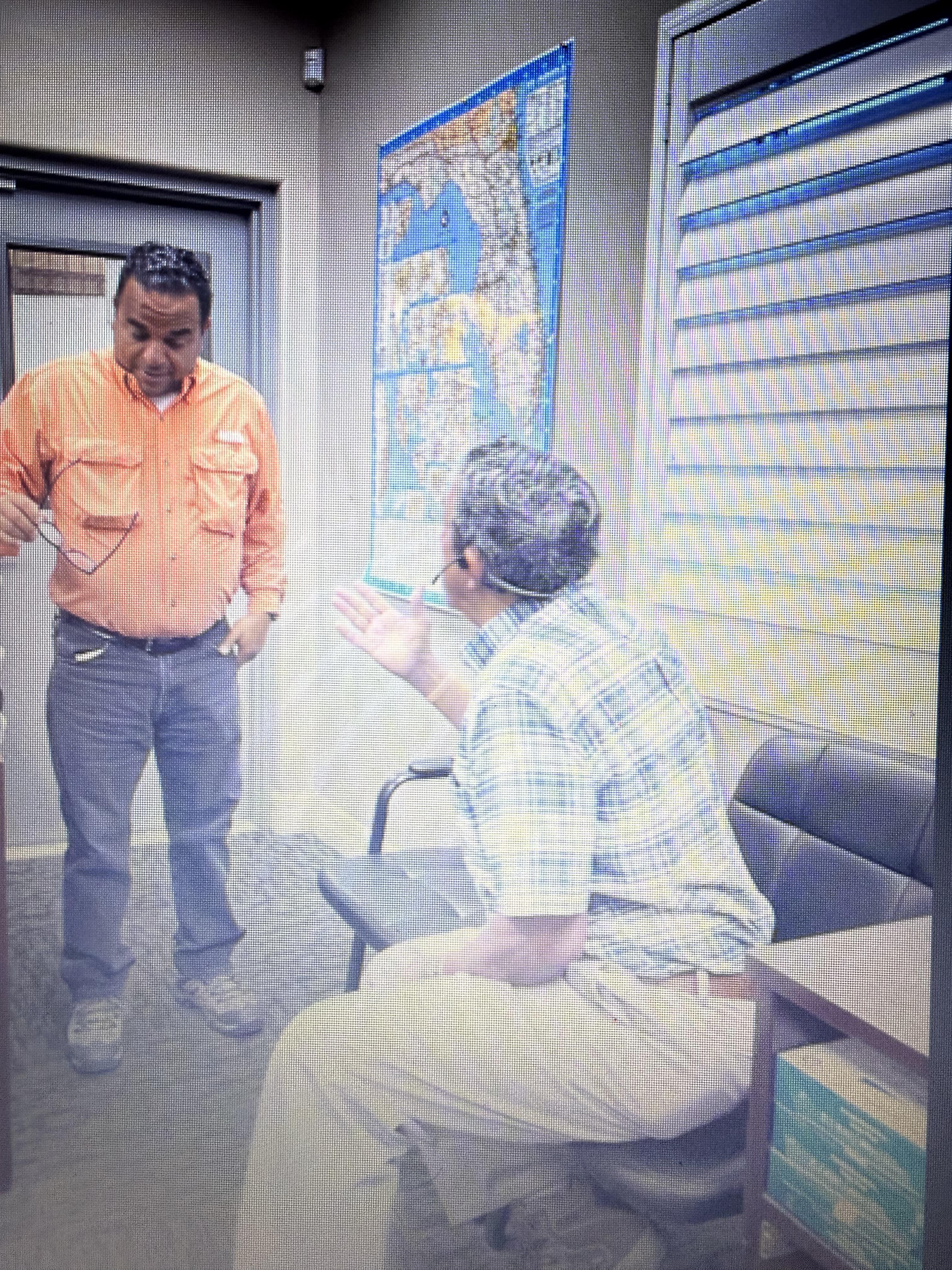 A man talking to a woman