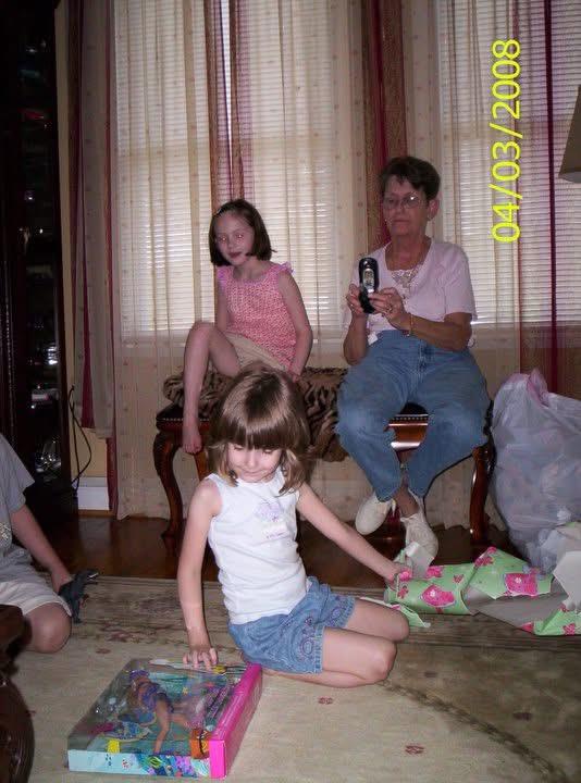 A group of people sitting on the floor