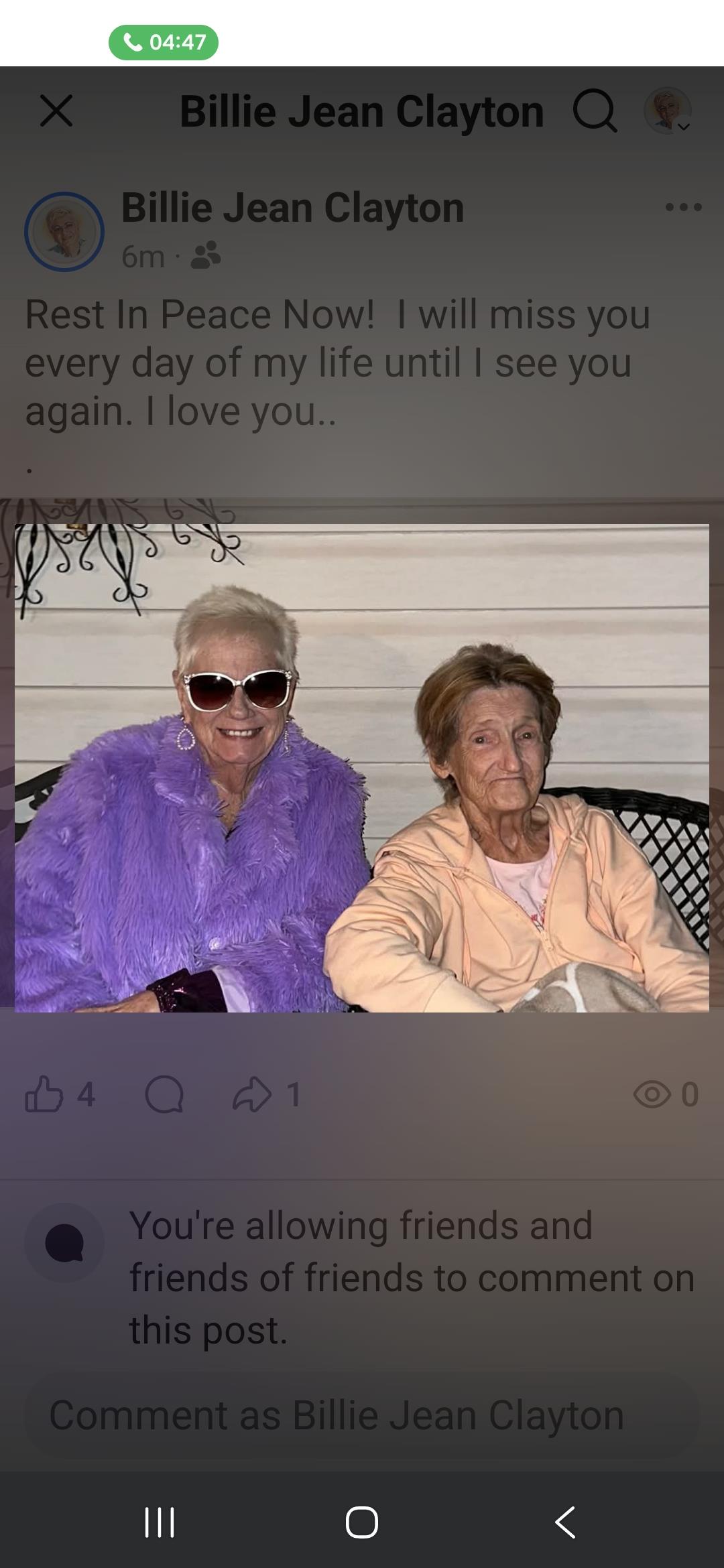 Two women sitting on a bench
