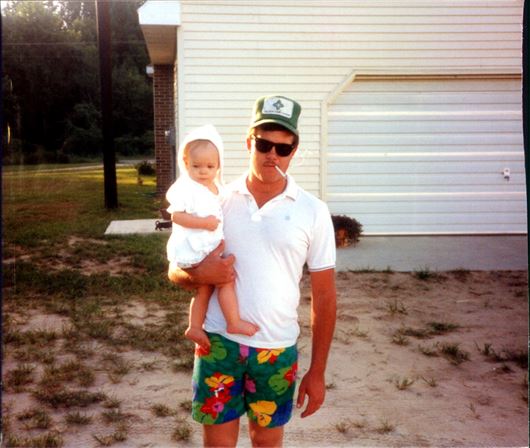 A man holding a baby