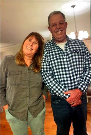 A man and woman standing together
