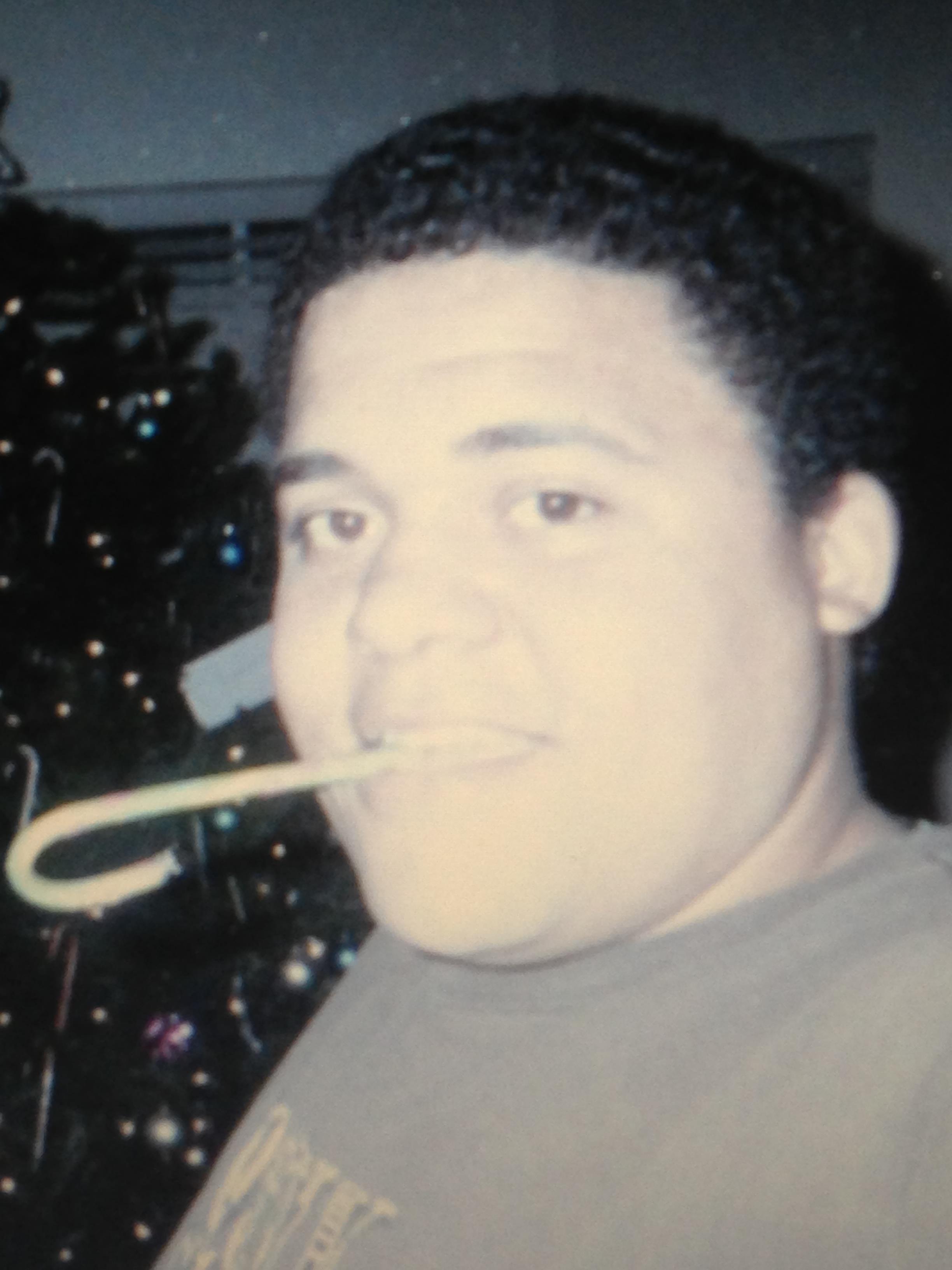 A man with a tube in his mouth