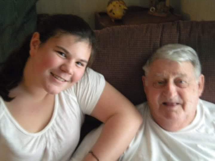 A man and woman posing for a picture