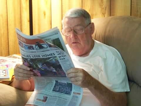 A man reading a newspaper