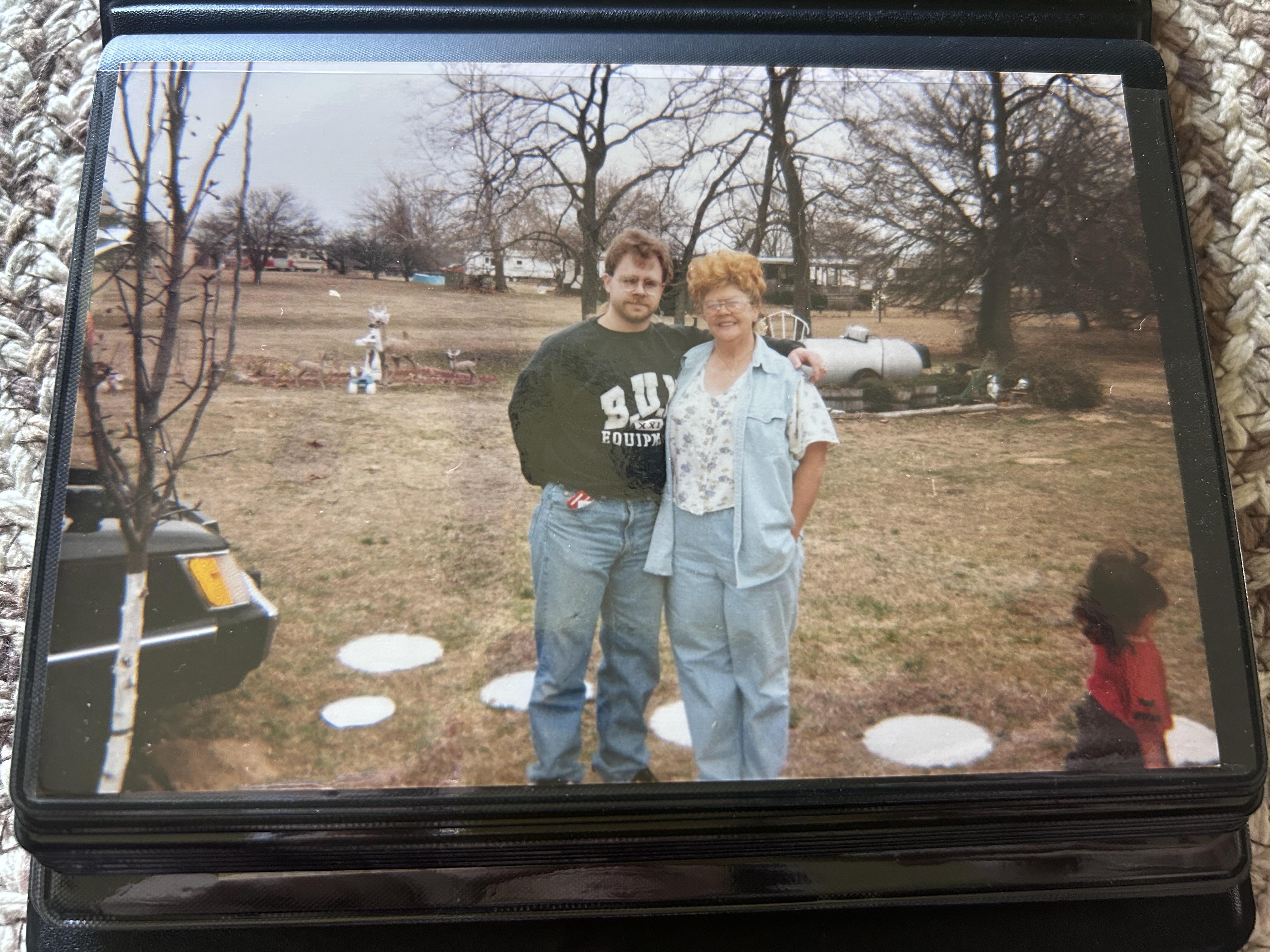 A man and woman posing for a picture