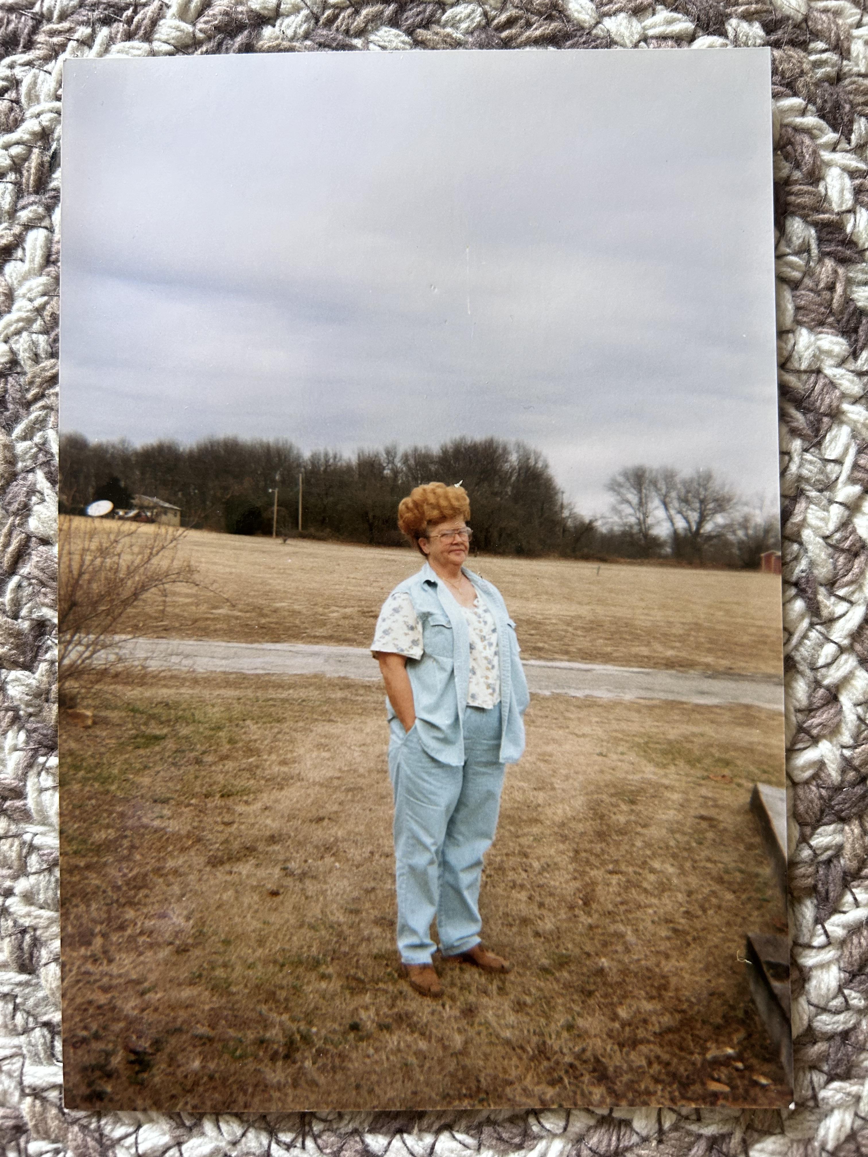 A woman standing in a field