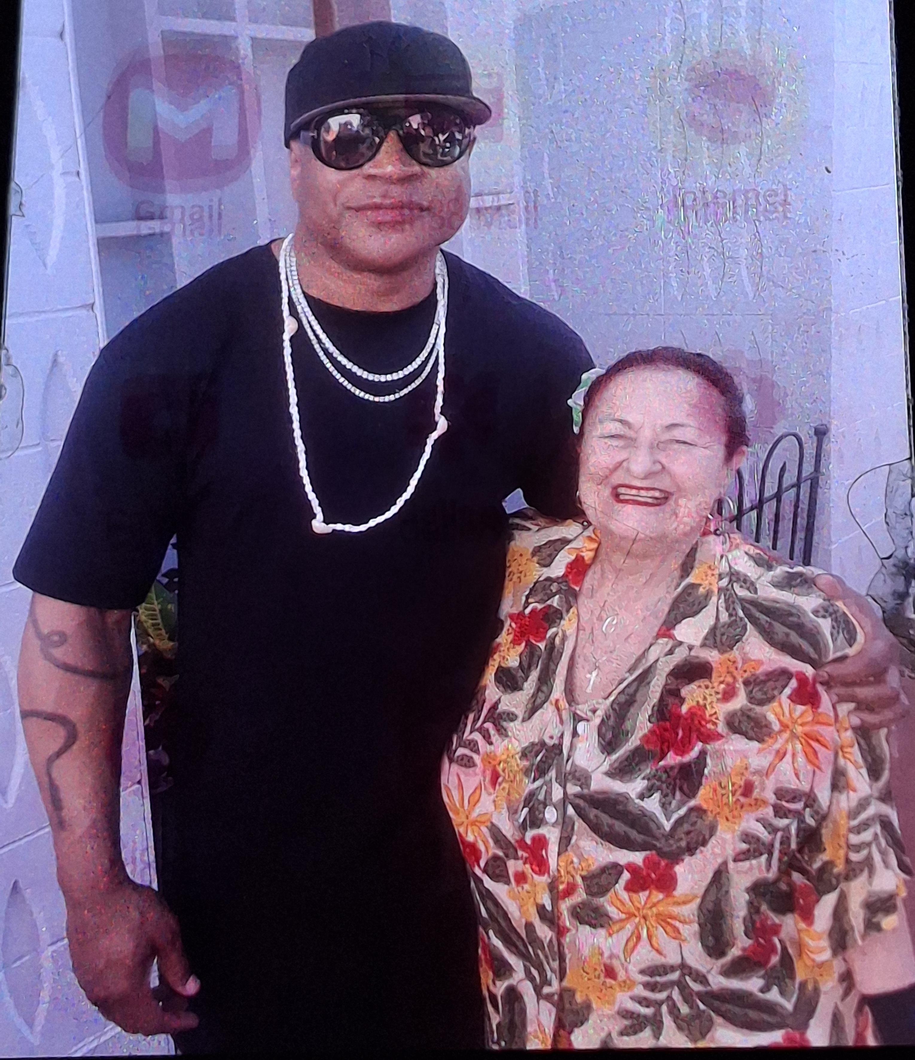 A man and woman posing for a picture