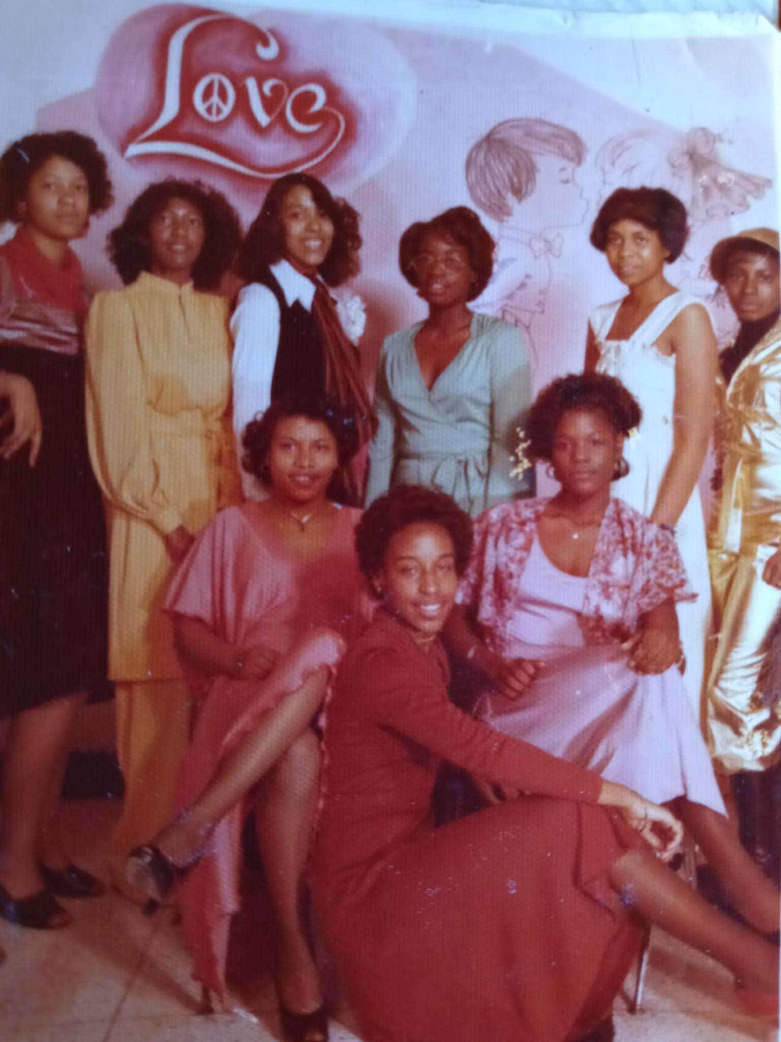 A group of women posing for a photo