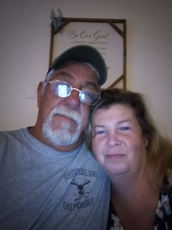 A man and woman taking a selfie