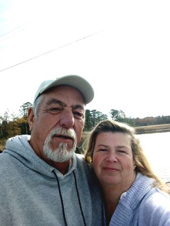 A man and woman taking a selfie