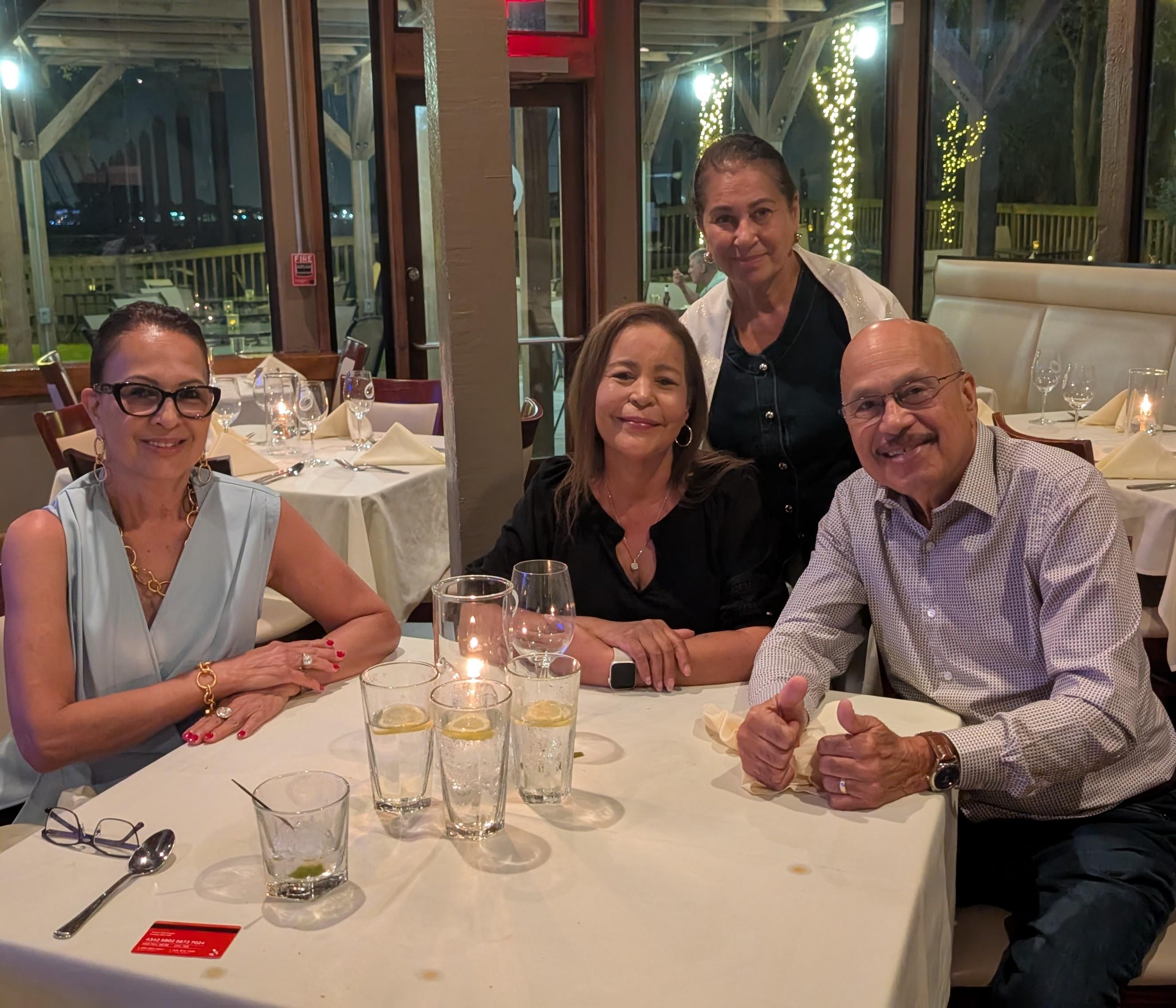 A group of people sitting at a table