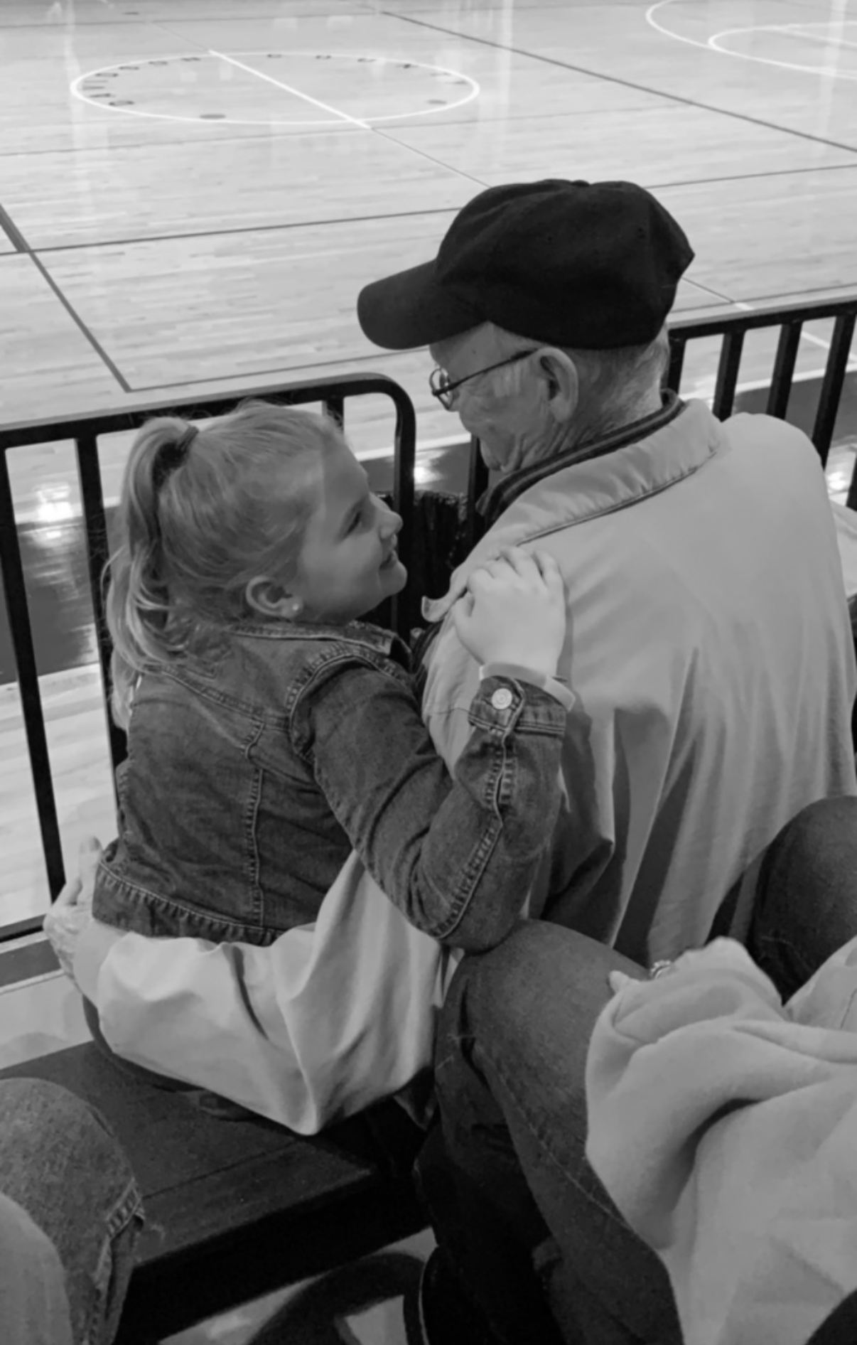 A man and a girl hugging