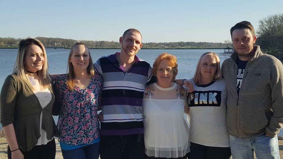 A group of people posing for a photo