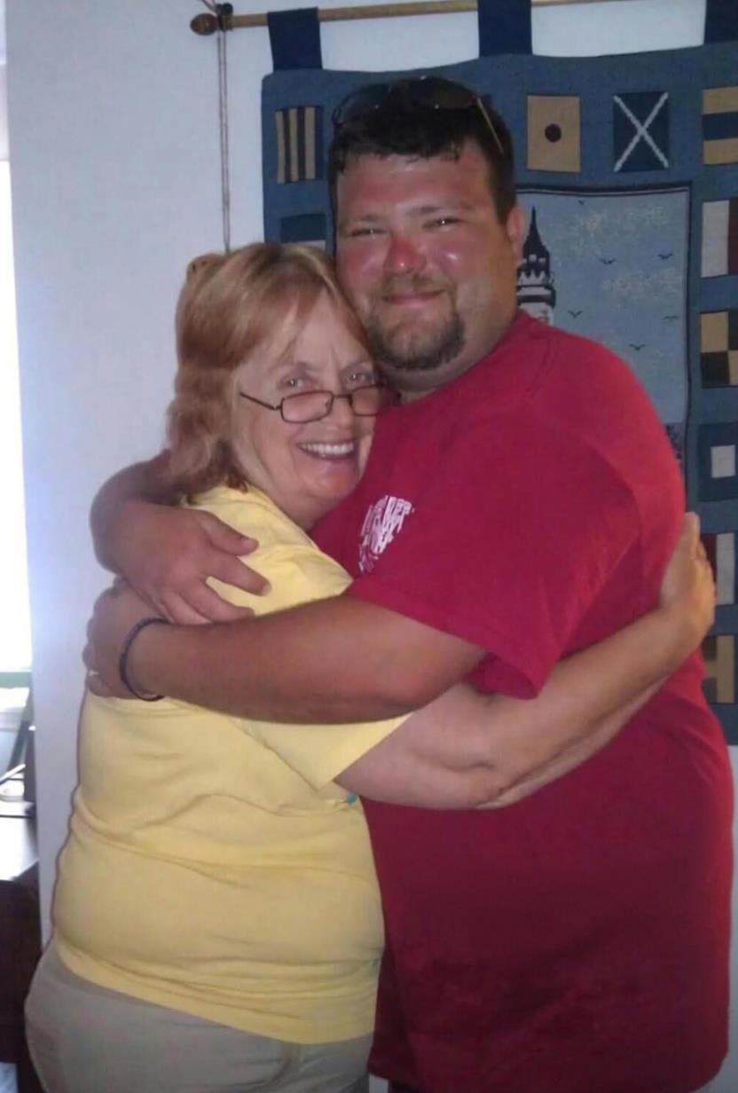 A man and woman hugging