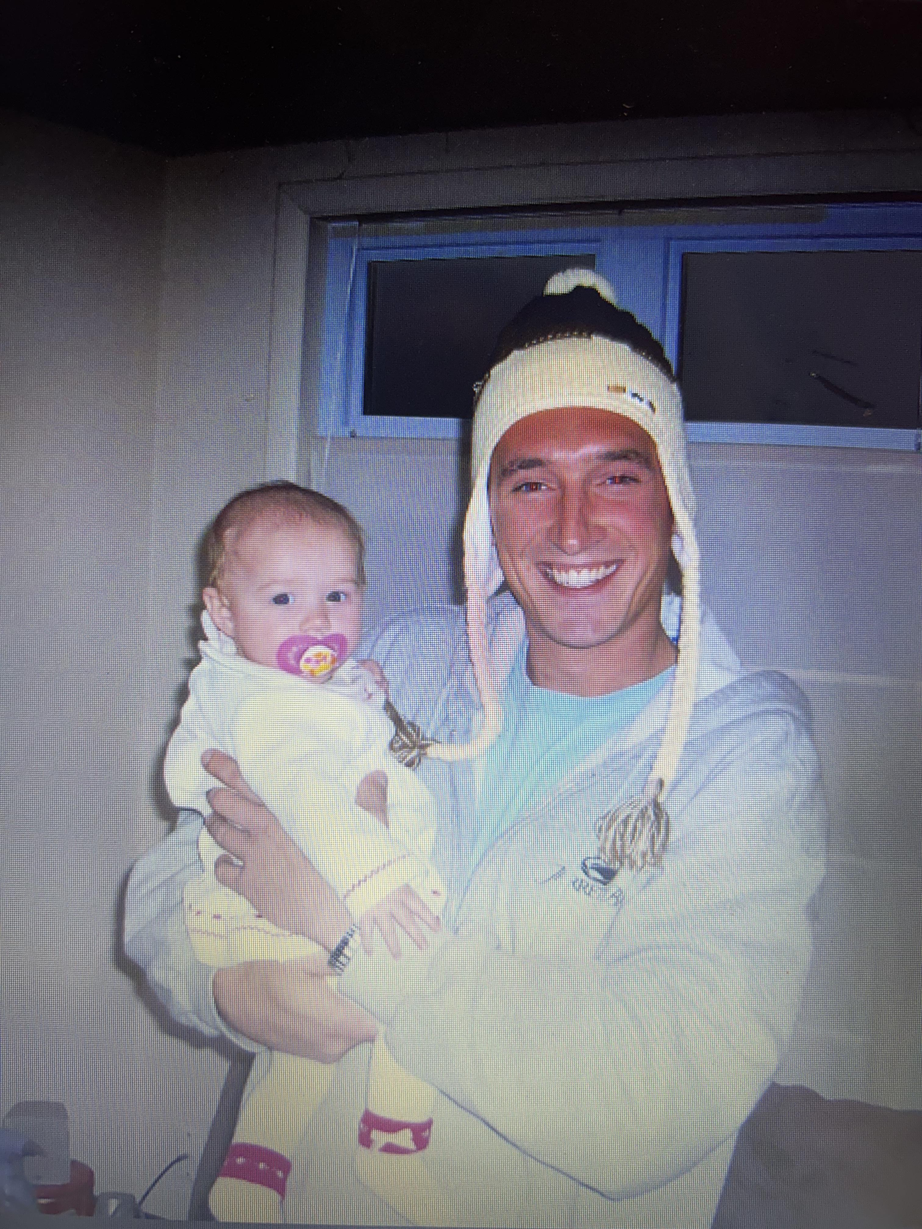 A man holding a baby