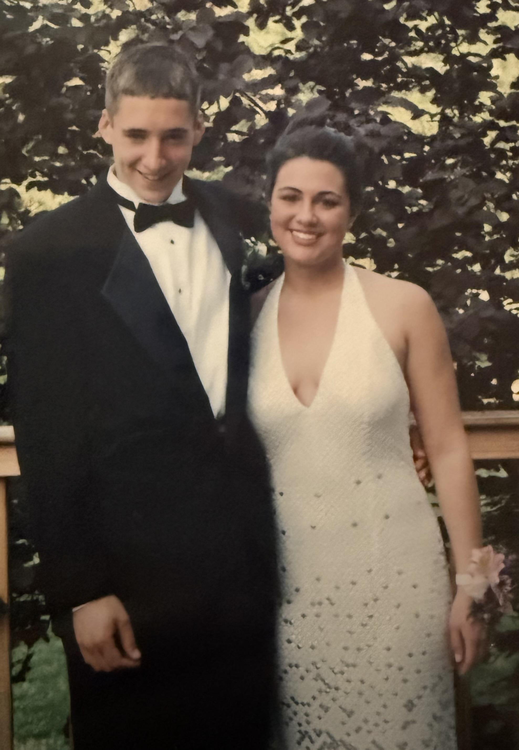 A man and woman posing for a picture