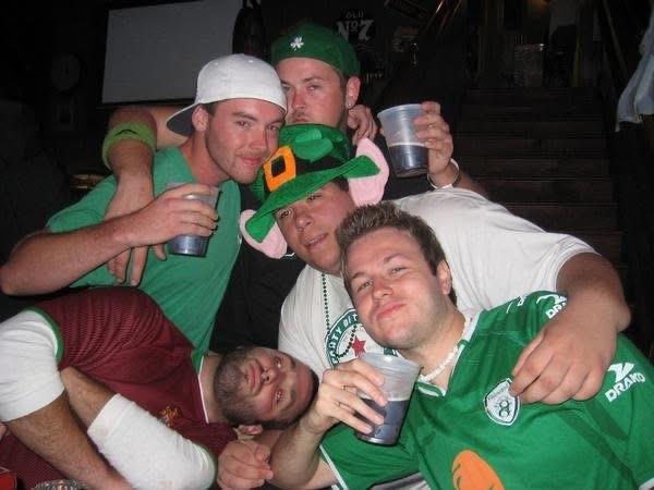 A group of men posing for a picture