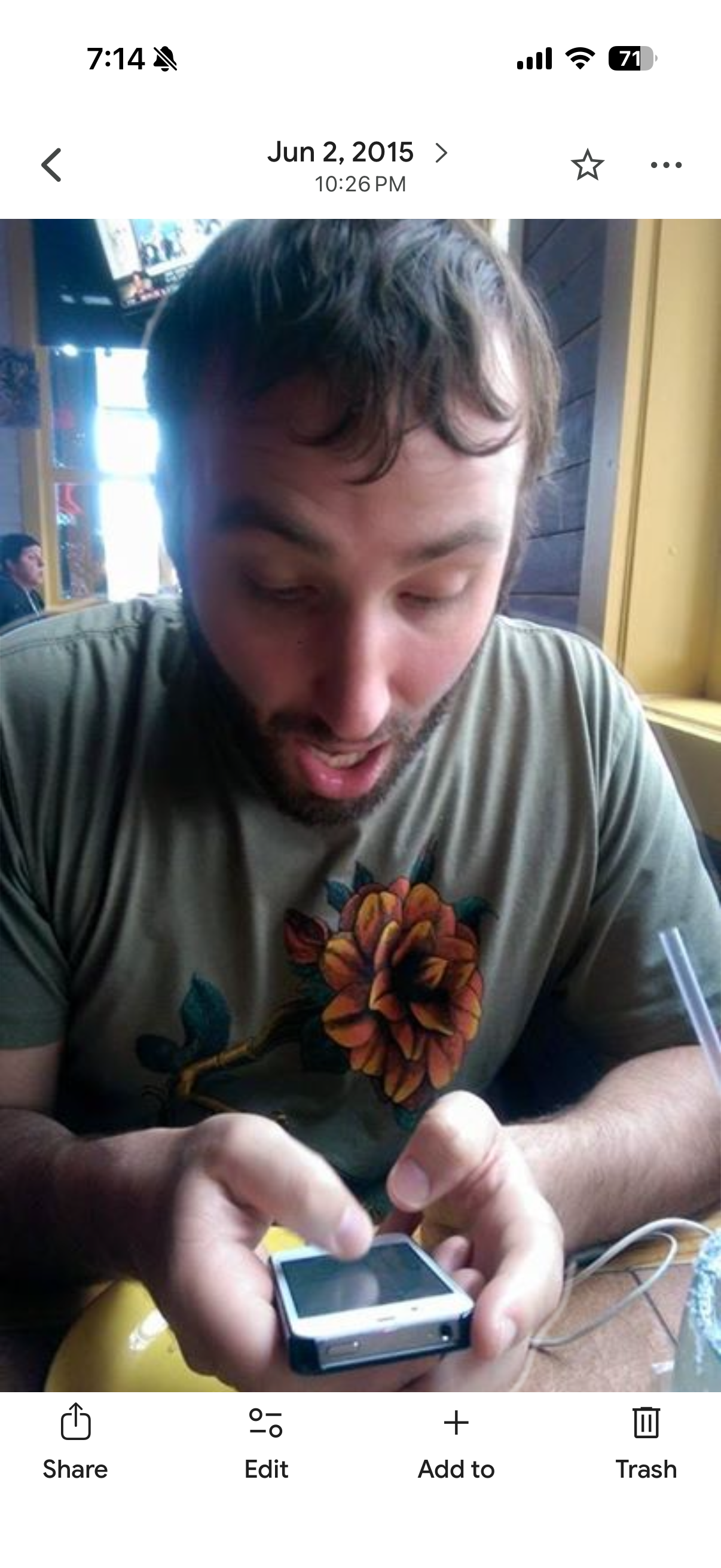 A man looking at his phone