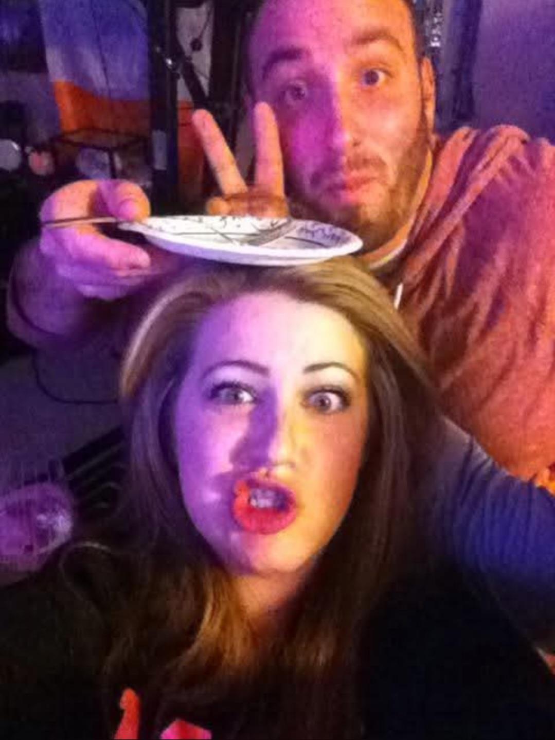 A man and woman taking a selfie