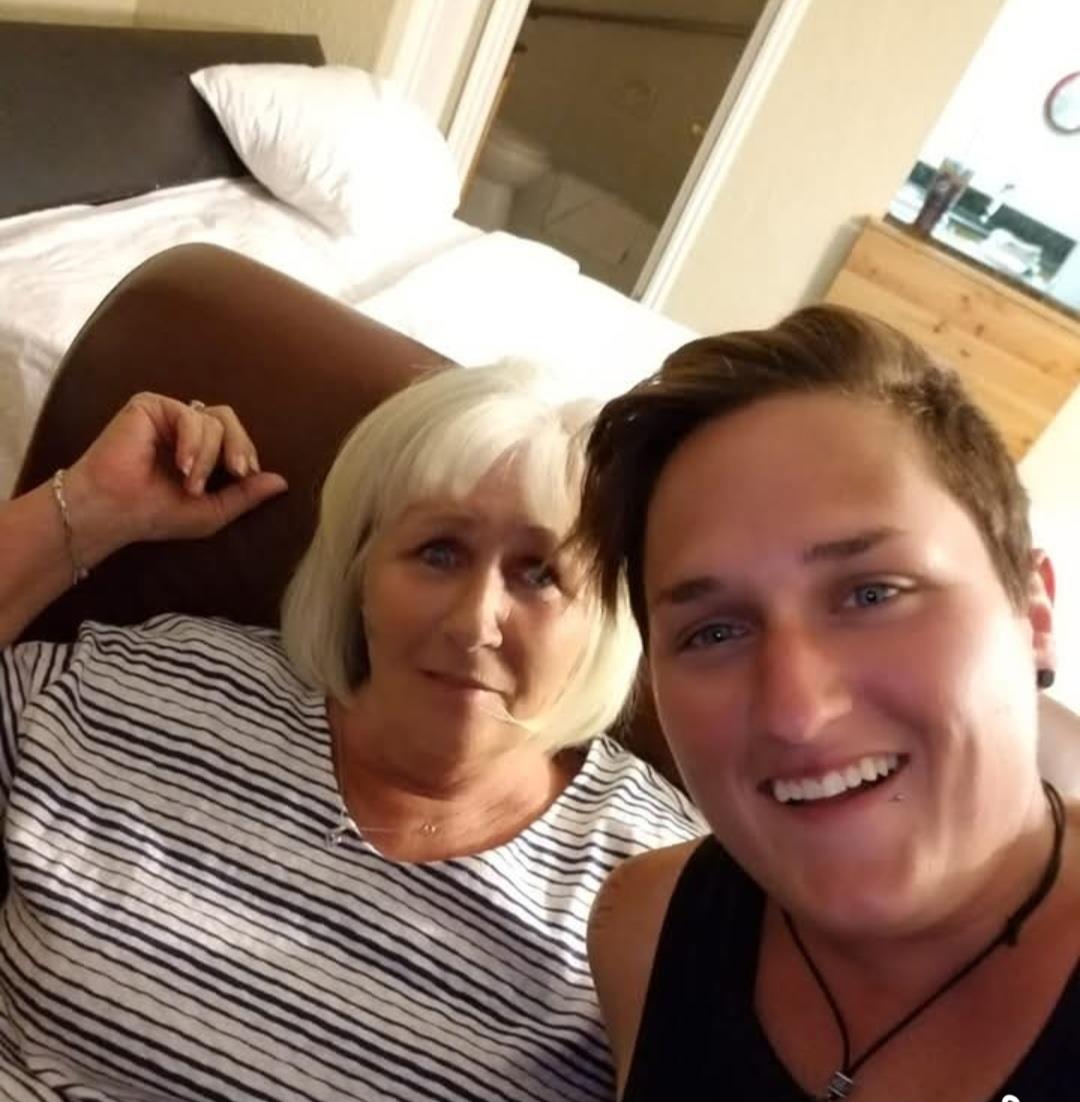 A man and woman taking a selfie