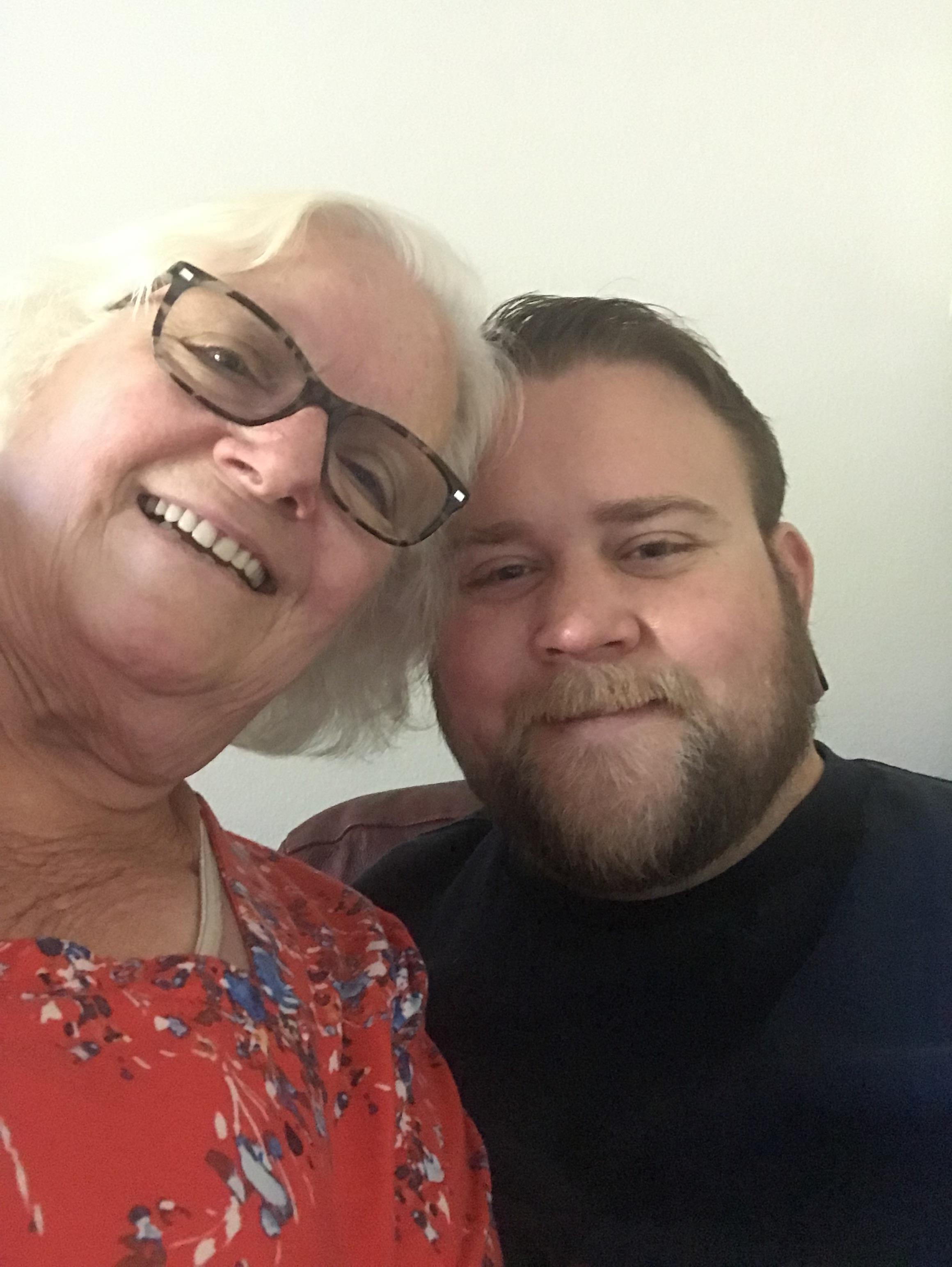 A man and woman taking a selfie