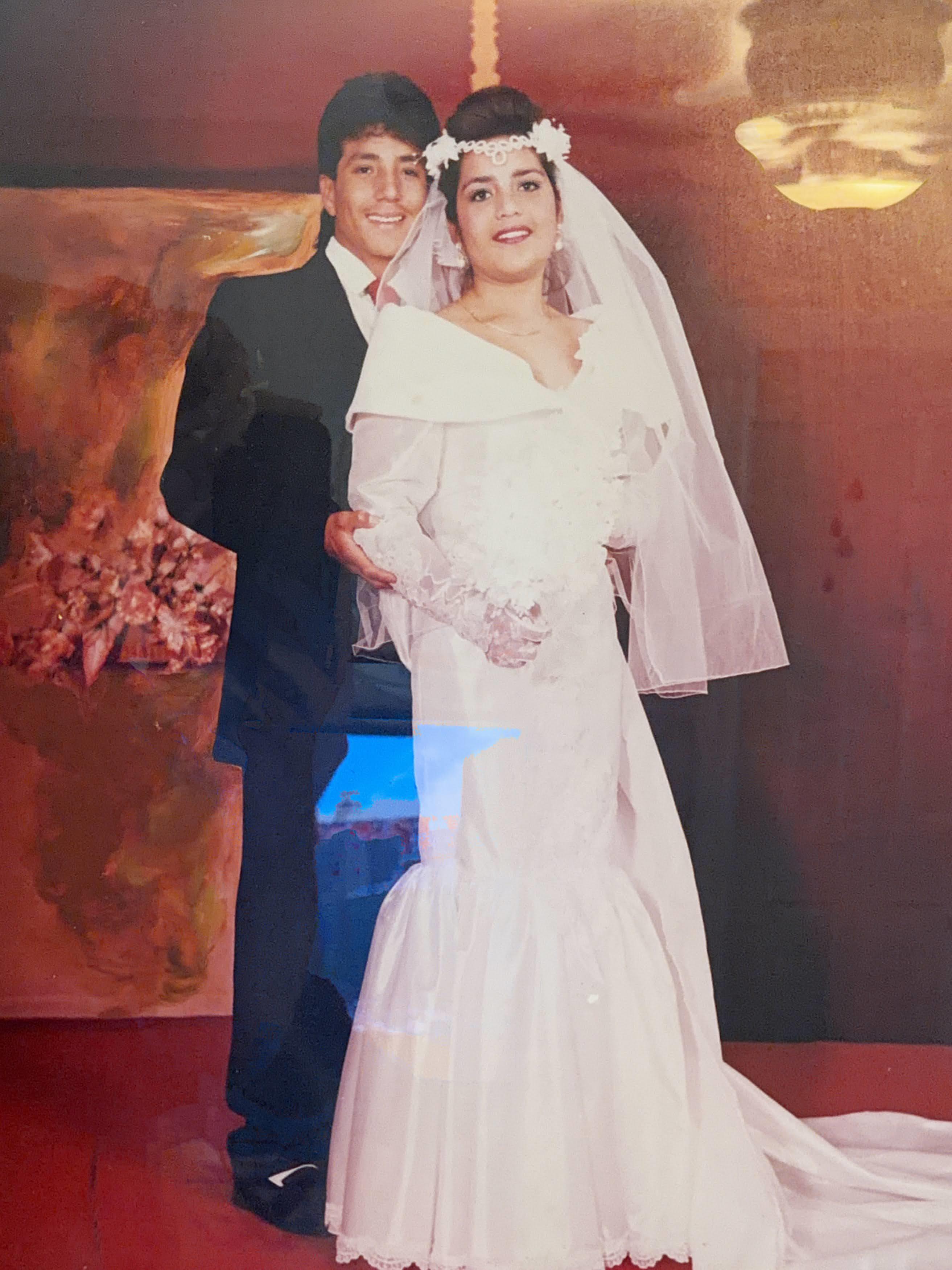 A man and woman in wedding attire