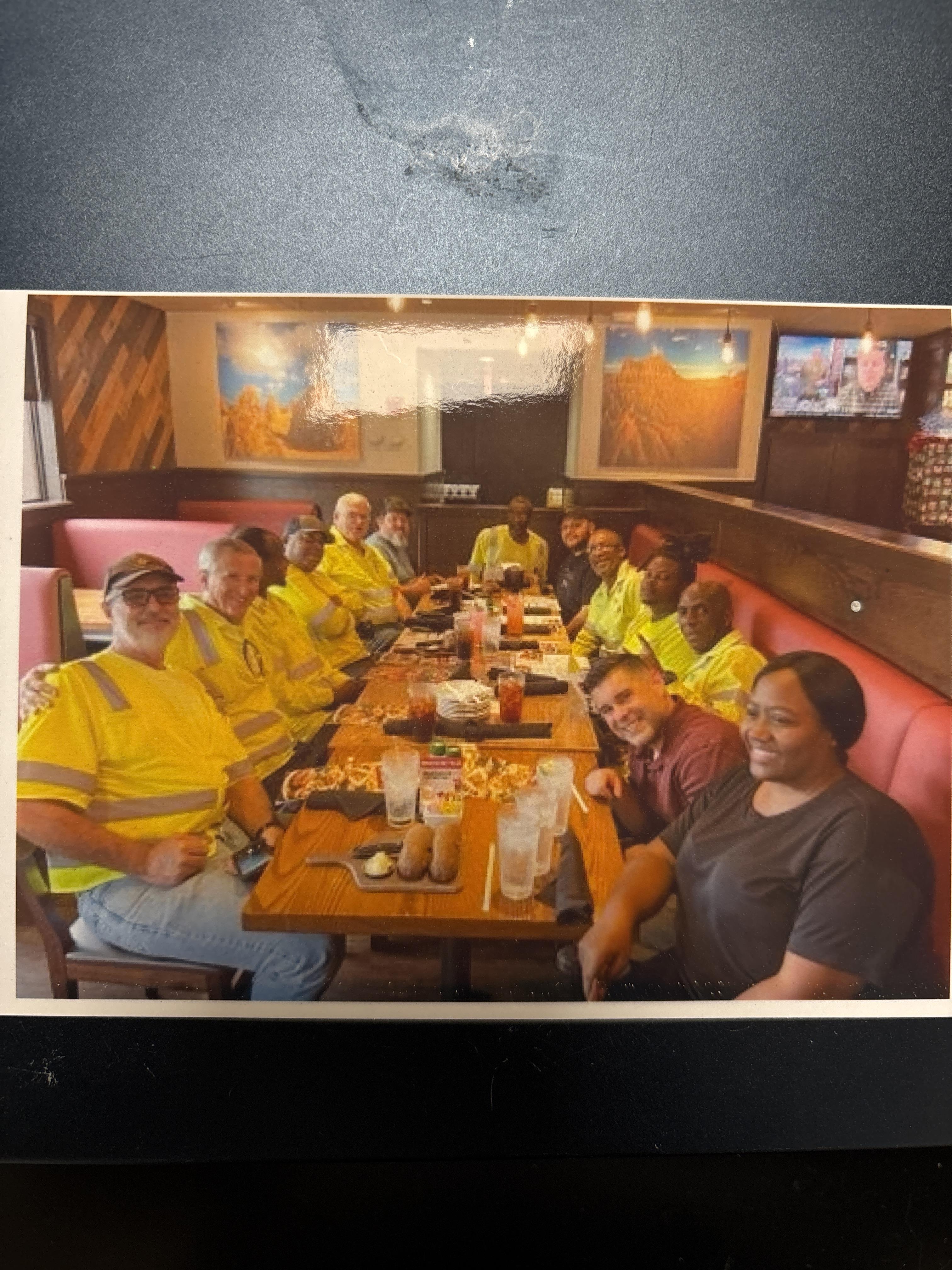 A group of people sitting at a table