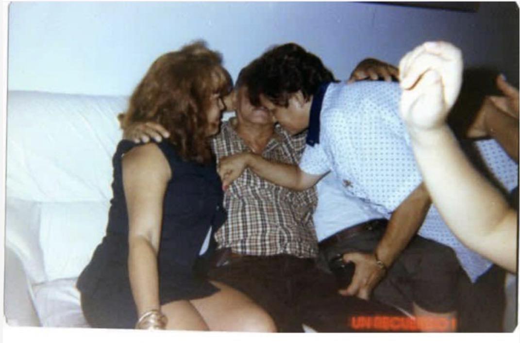 A group of people sitting on a couch