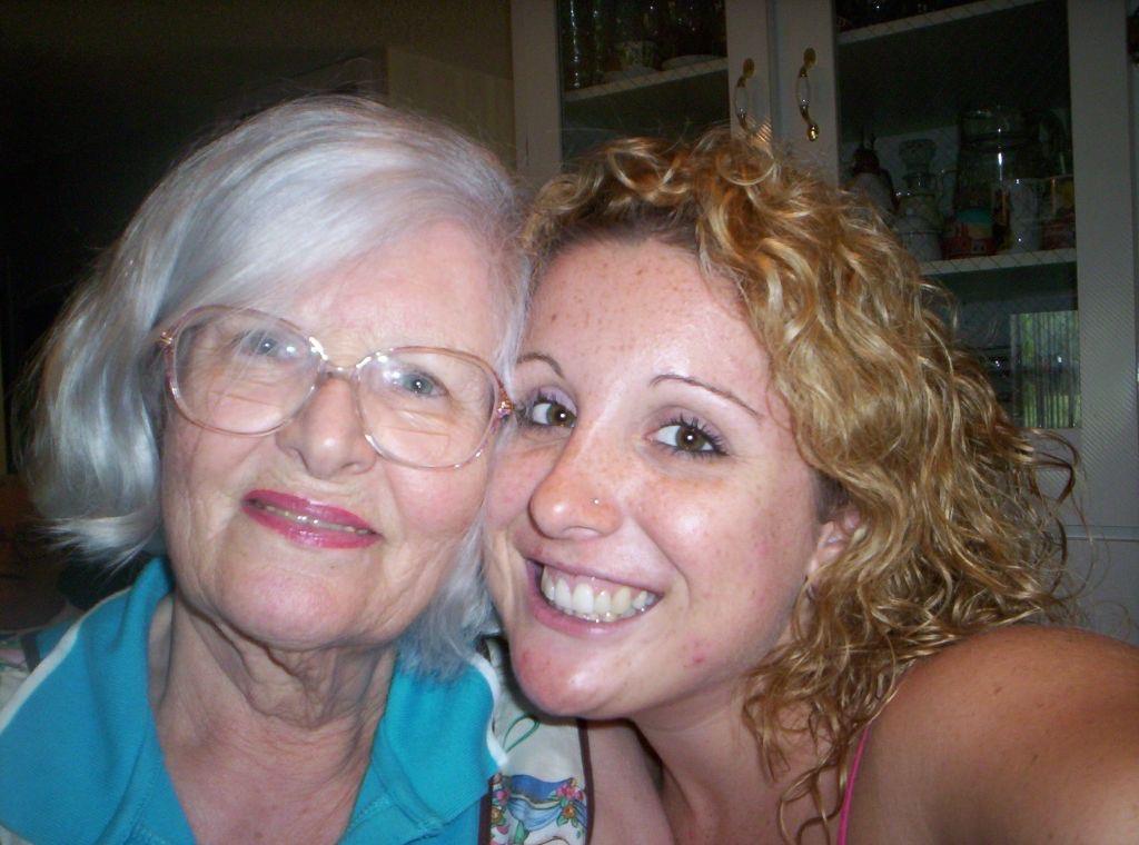 A woman and a young woman smiling