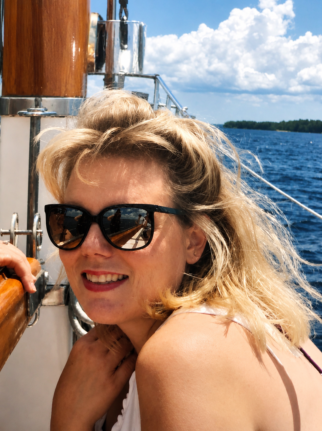 A woman smiling at the camera