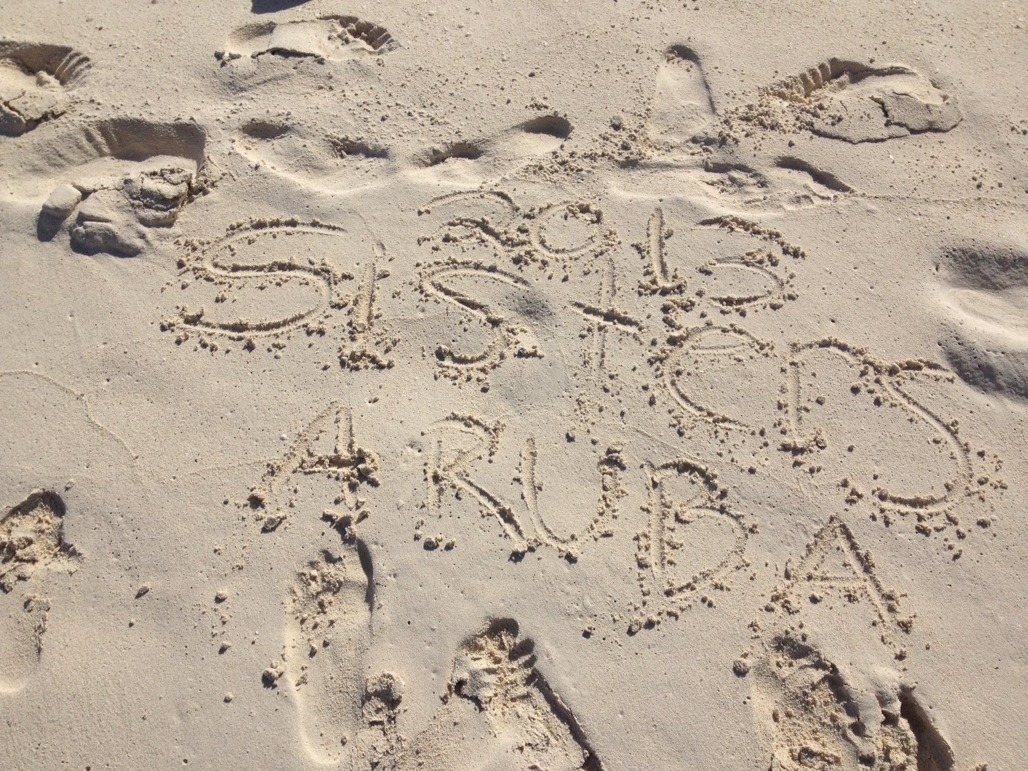 A writing in the sand