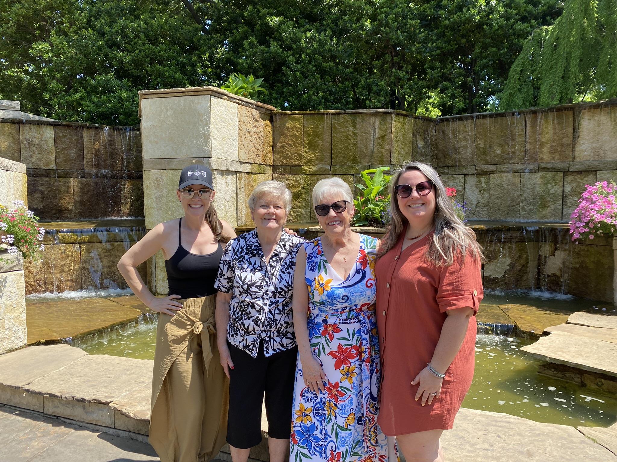A group of women posing for a photo