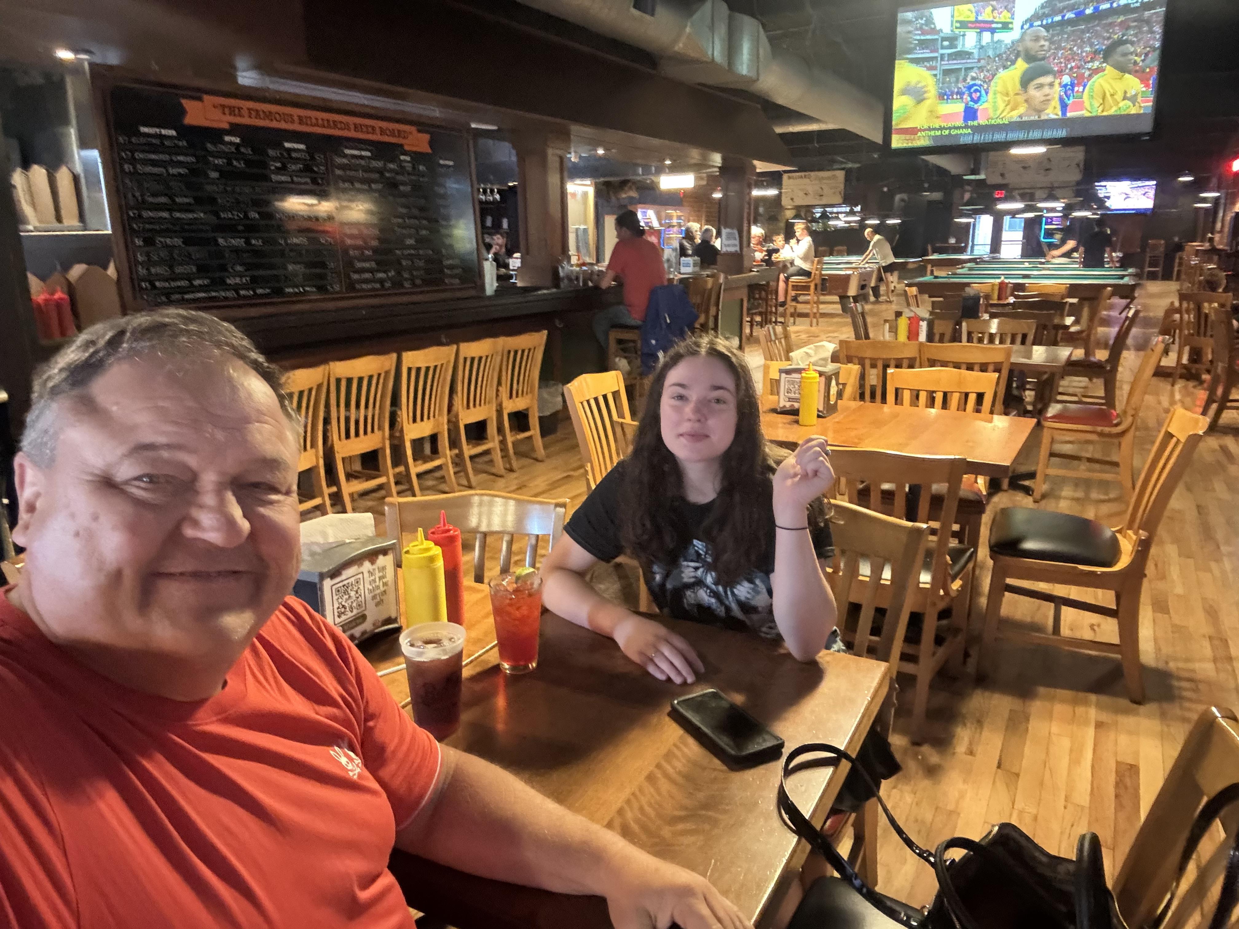 A man and woman sitting at a table