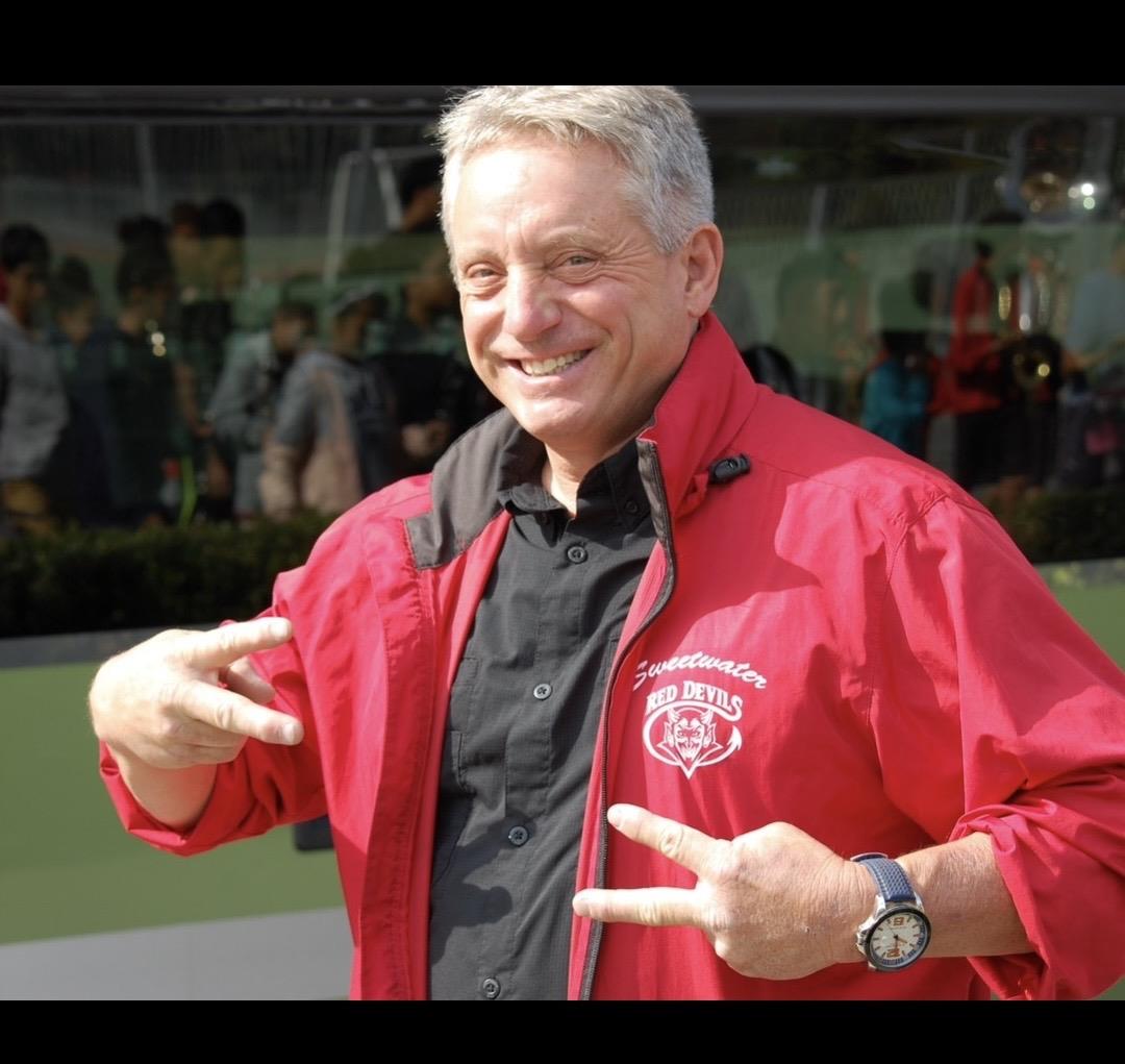 A man in a red jacket