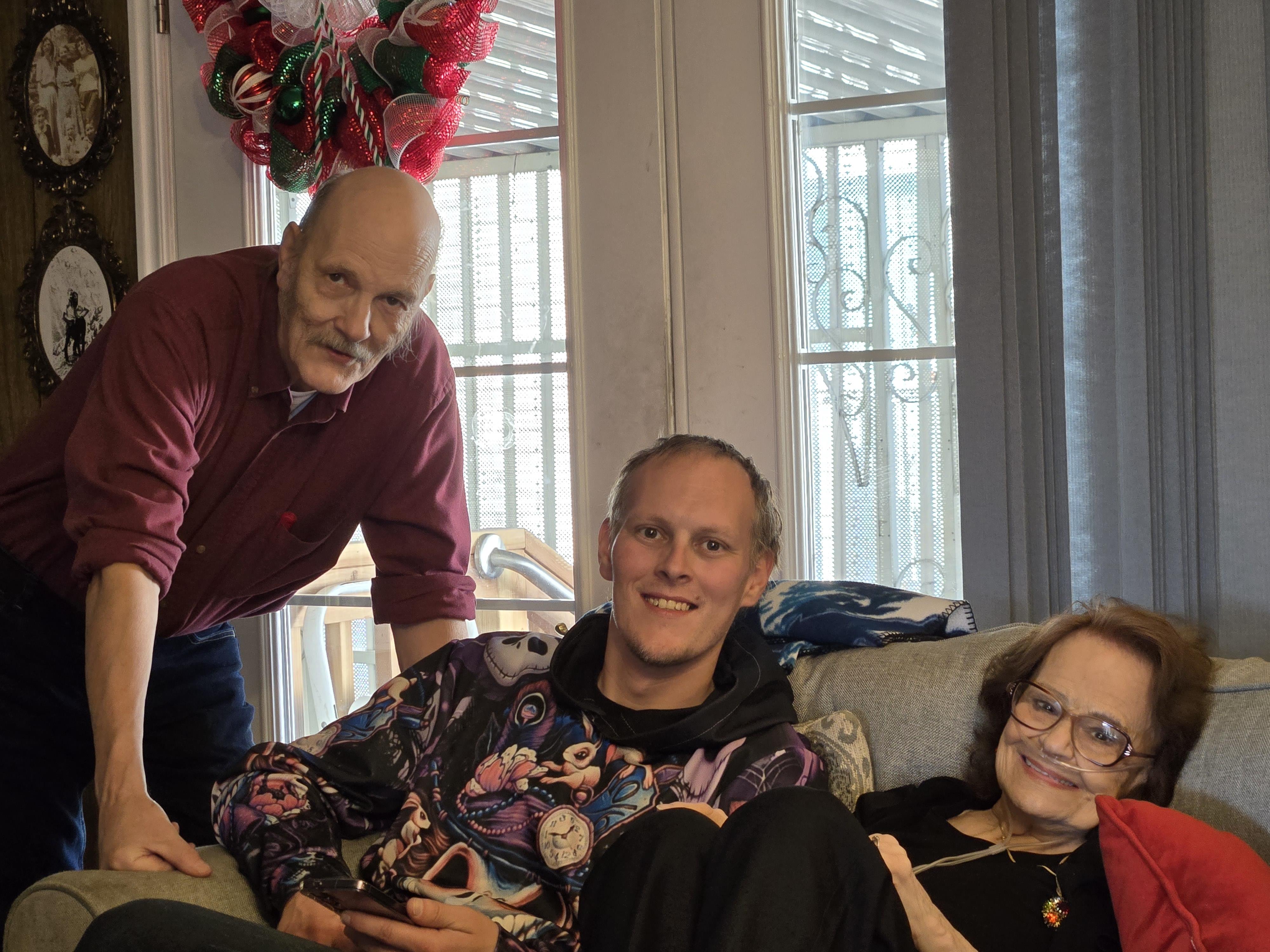 A group of people sitting on a couch
