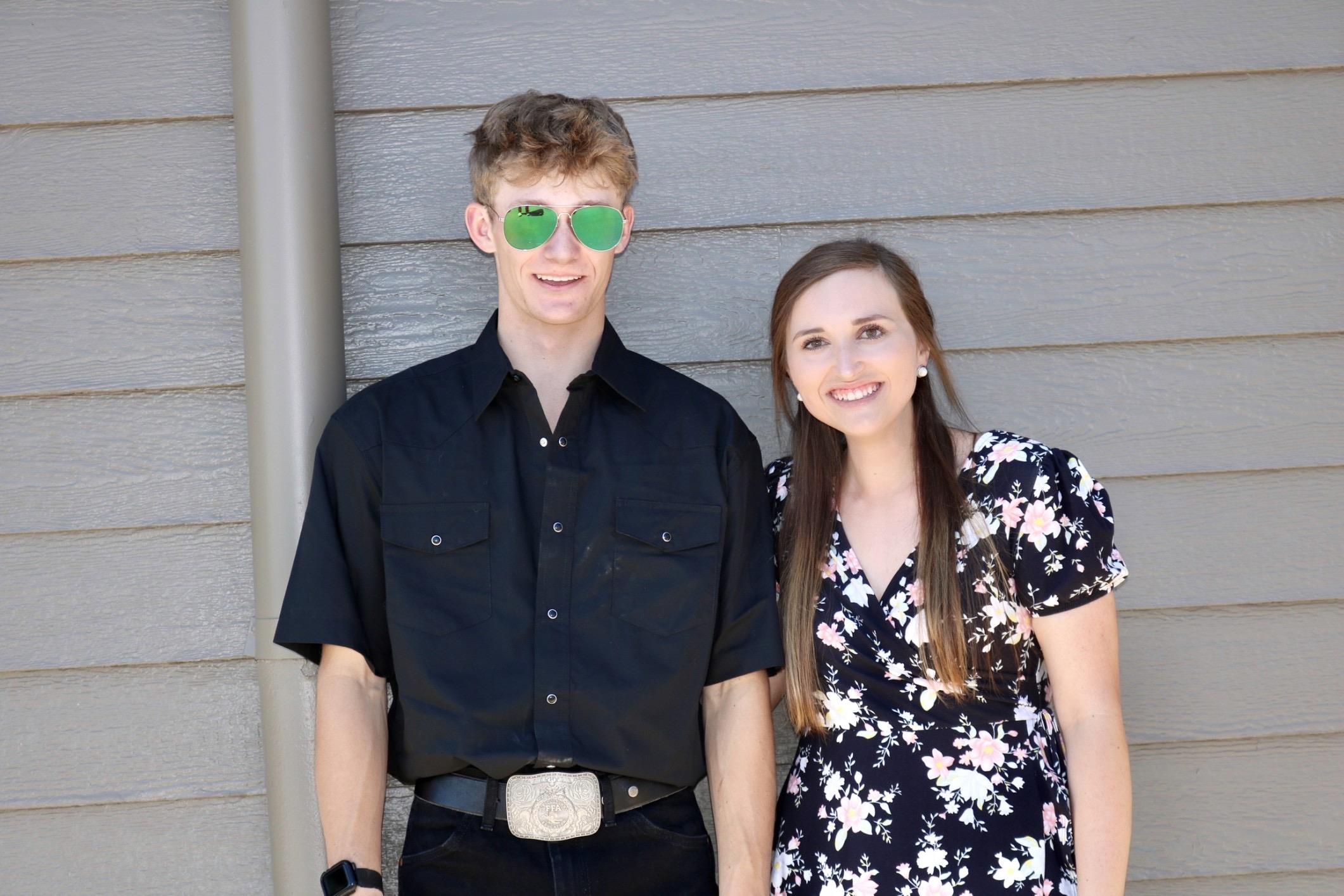 A man and woman standing next to each other