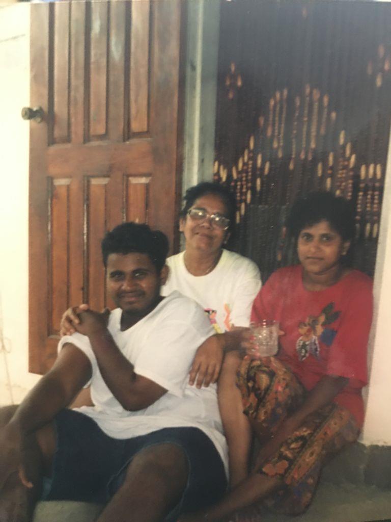 A group of people sitting on the floor
