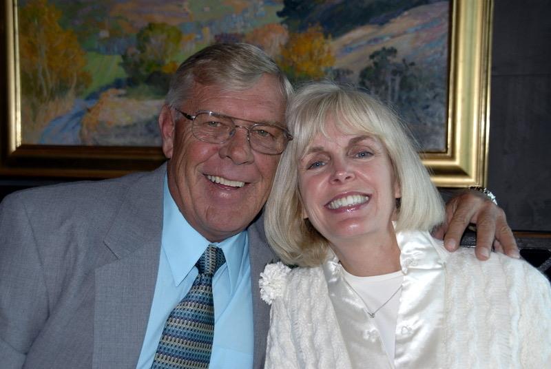 A man and woman smiling for a picture