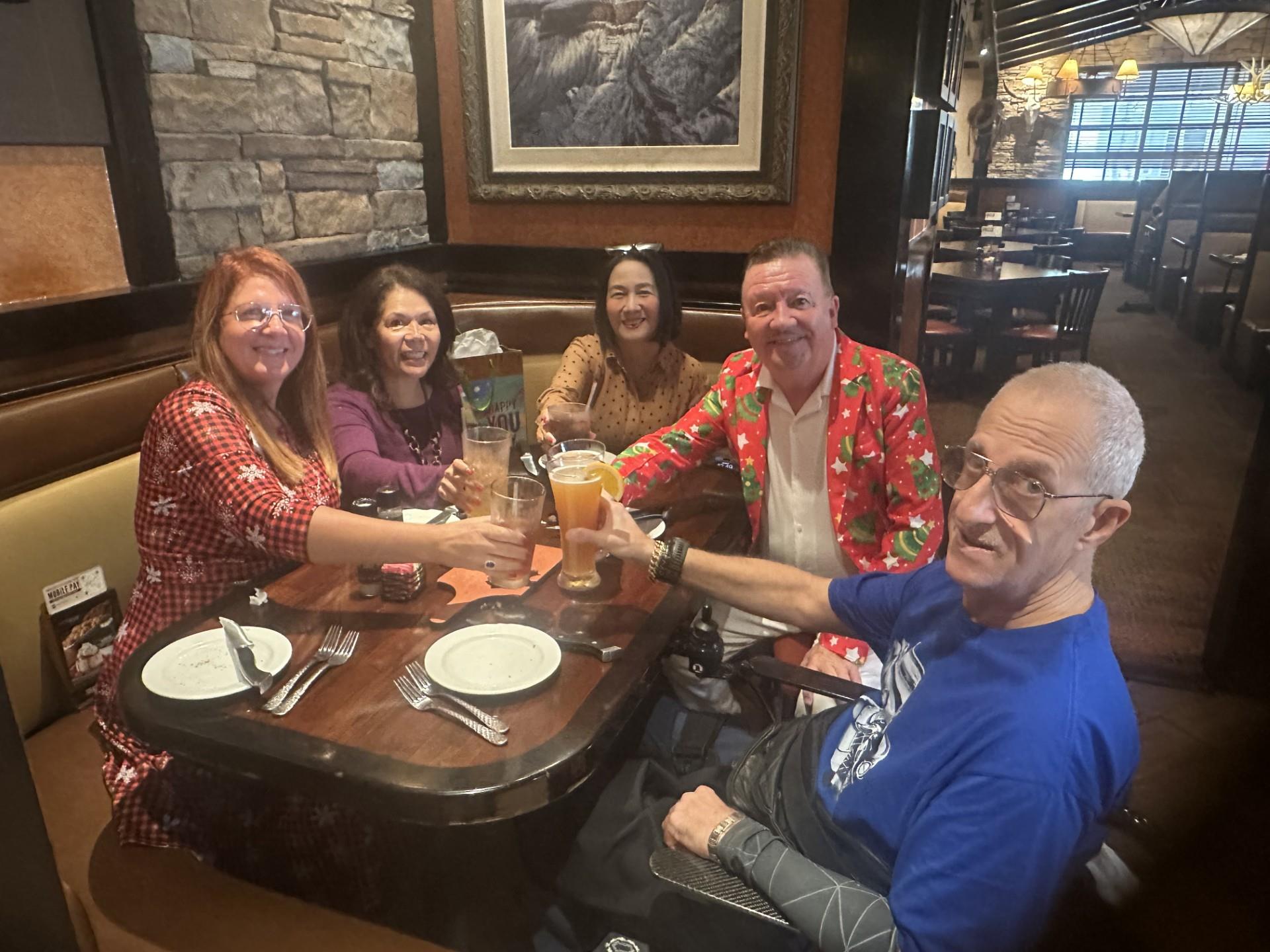 A group of people sitting at a table