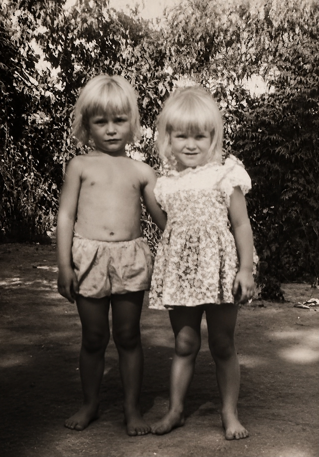 Two children standing together