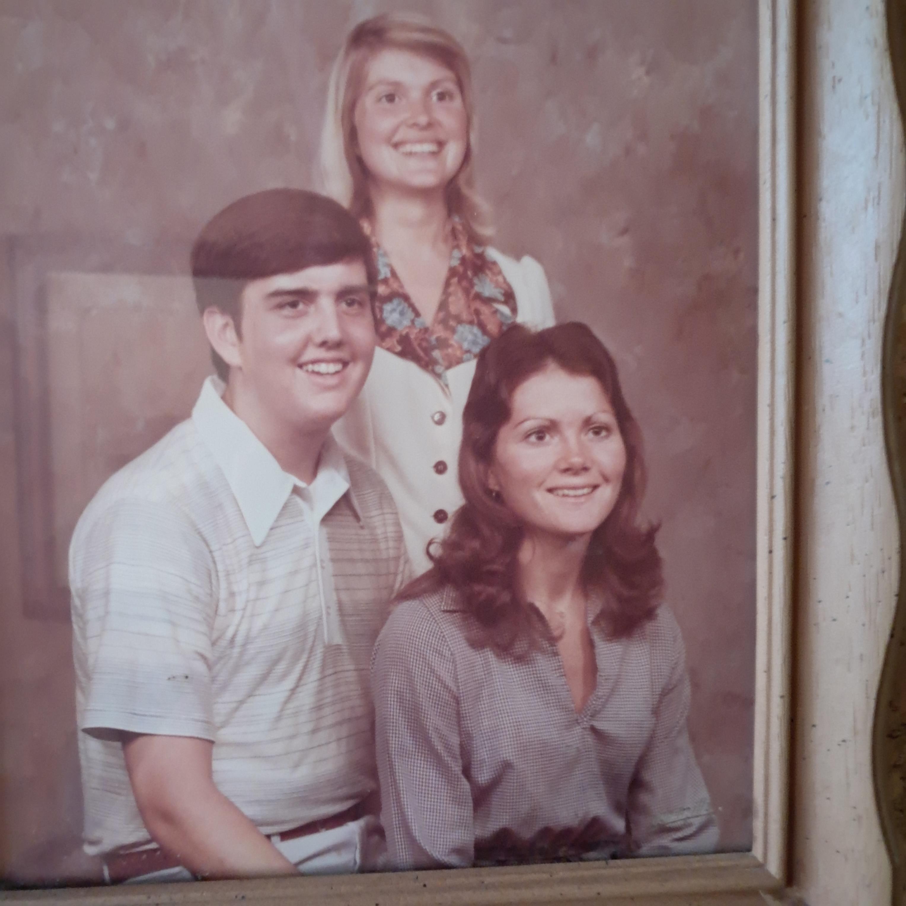 A group of people in a picture frame
