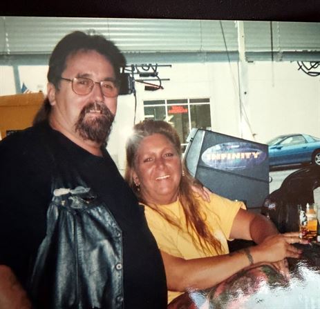 A man and woman sitting at a table