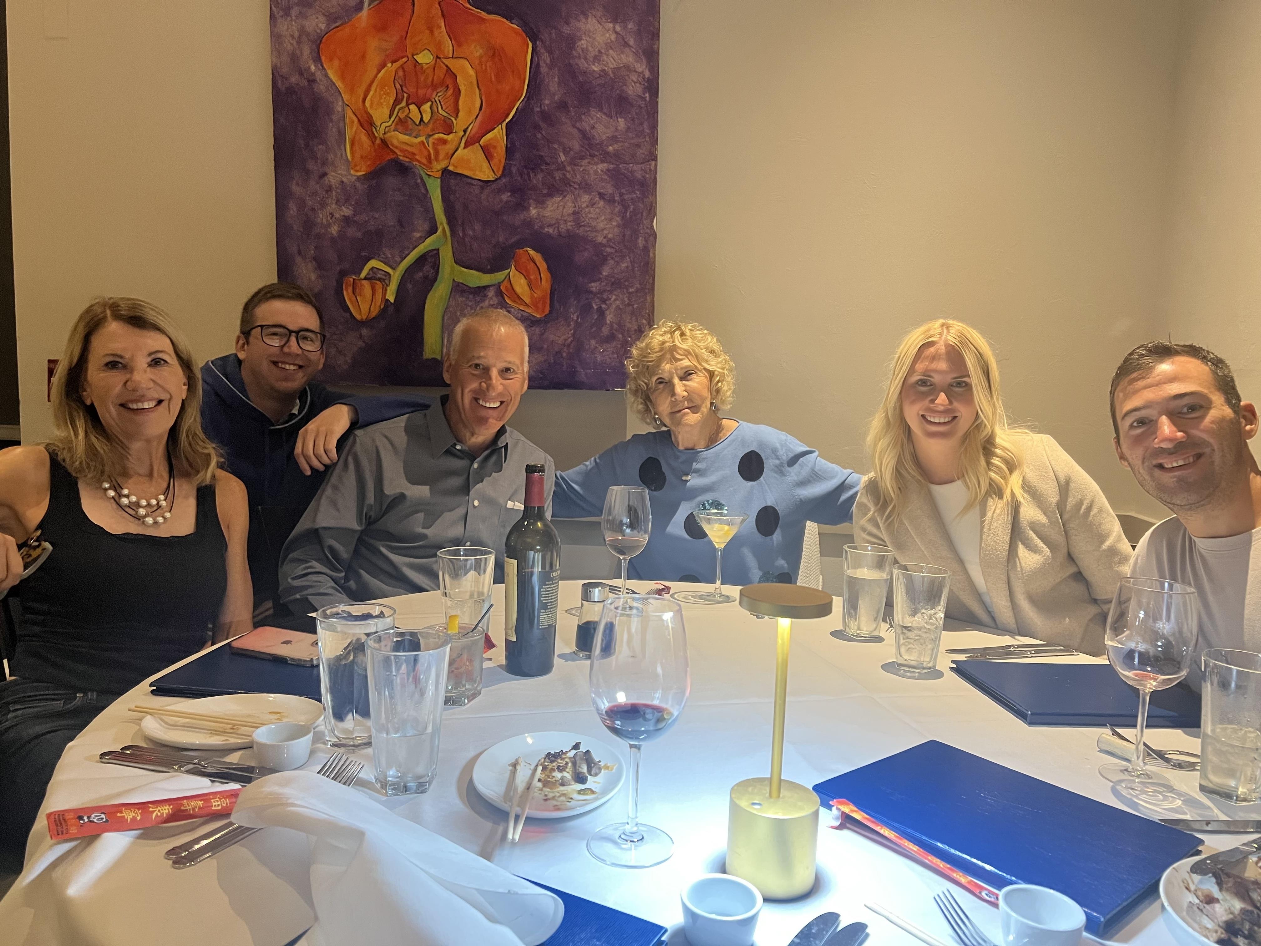 A group of people sitting at a table