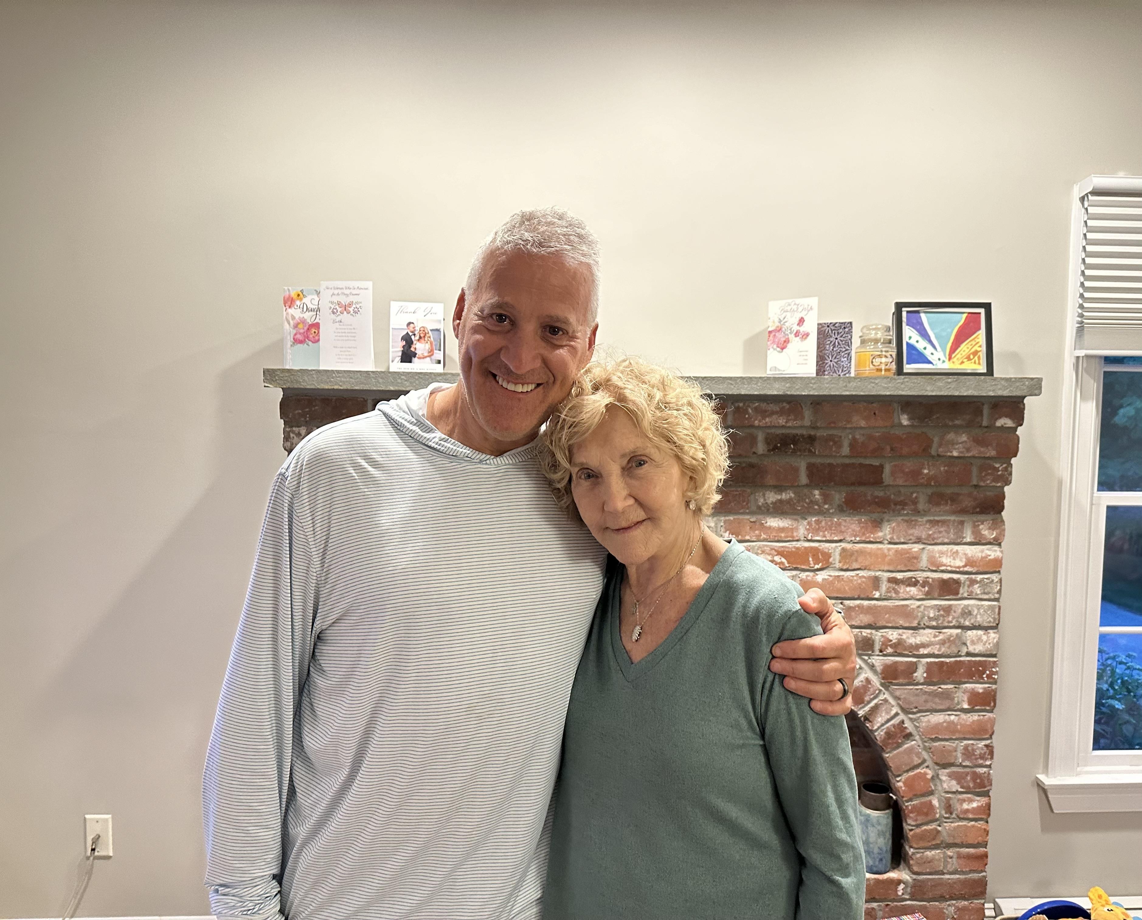 A man and woman posing for a picture