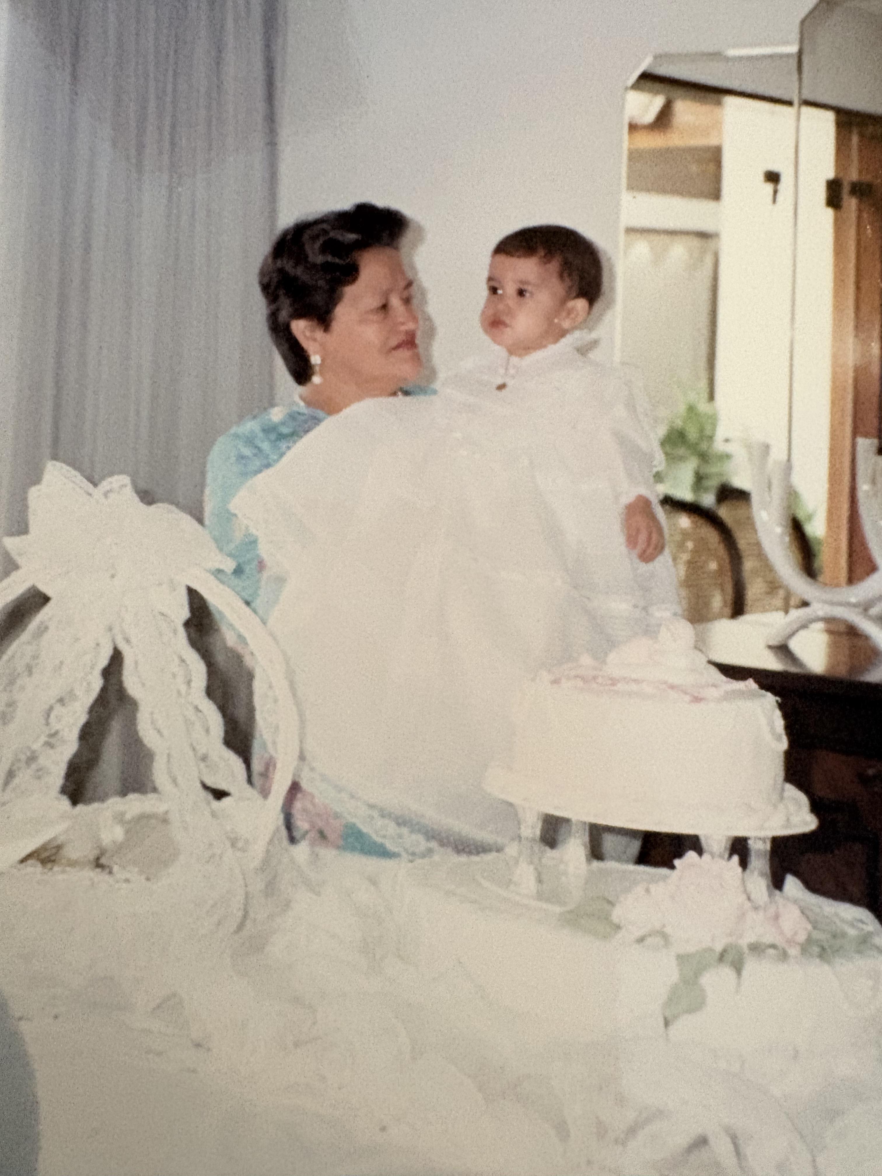 A woman holding a baby
