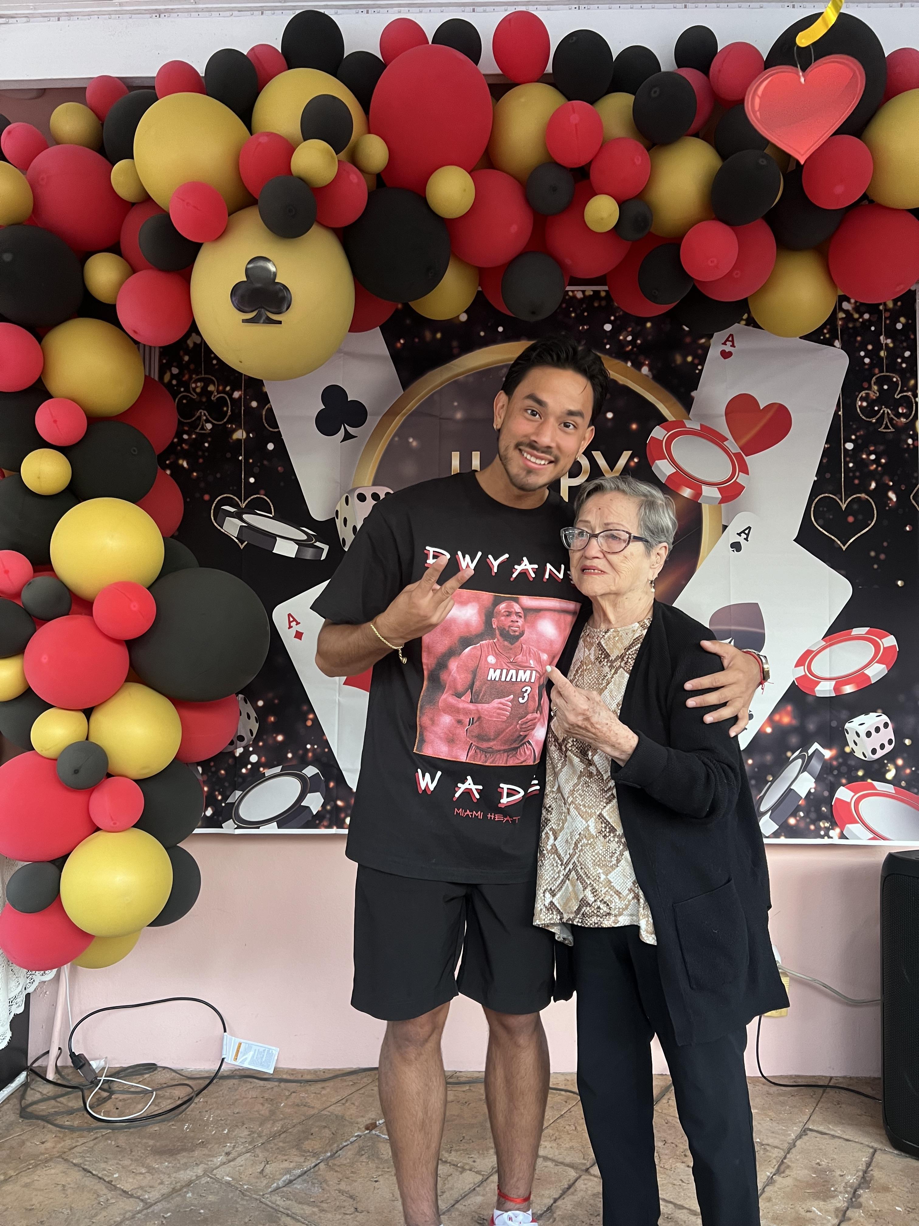 A man and woman posing for a photo
